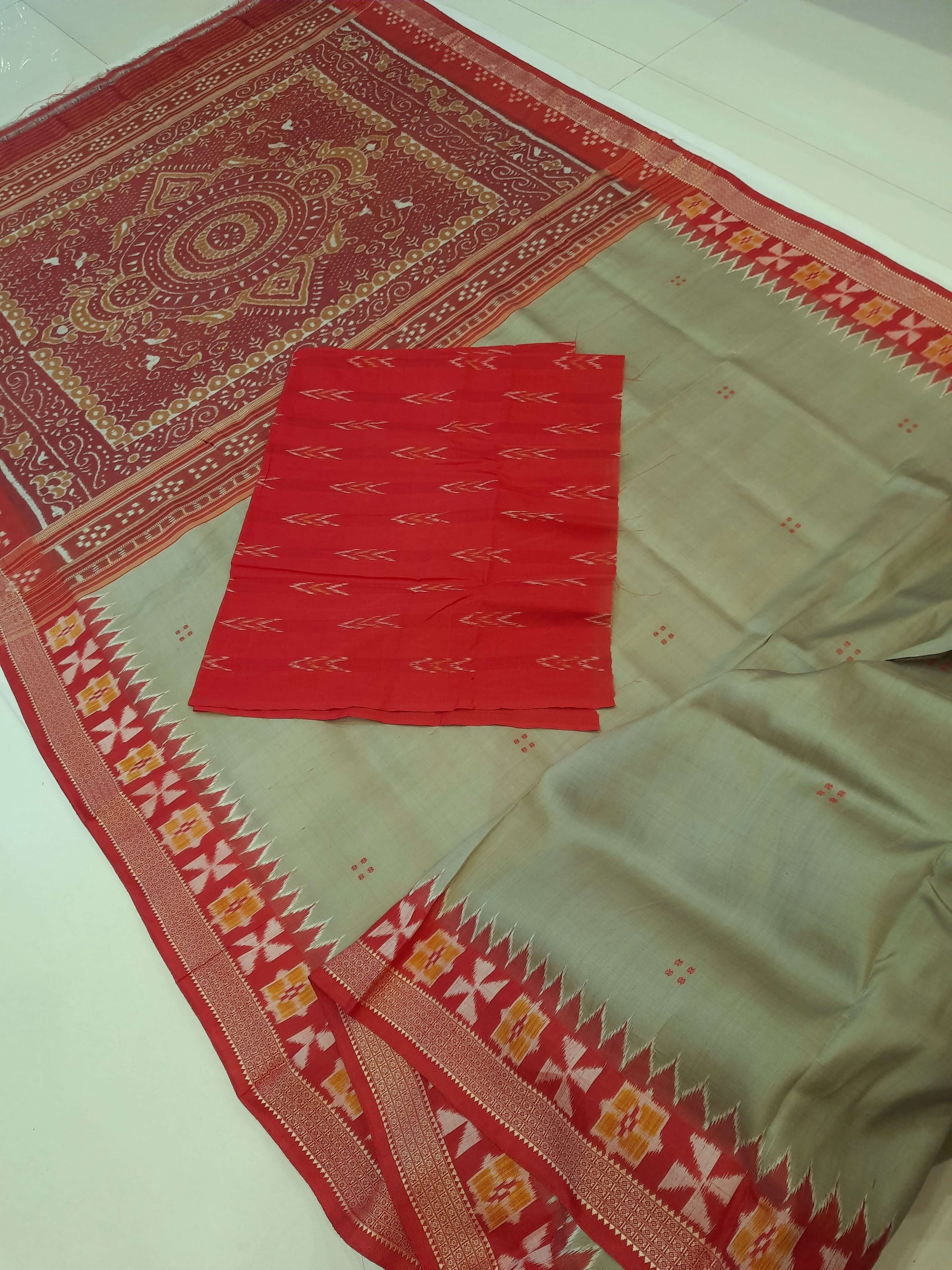 Greenish Grey Odisha Khandua Patta Silk Saree paired with cotton ikat blouse piece