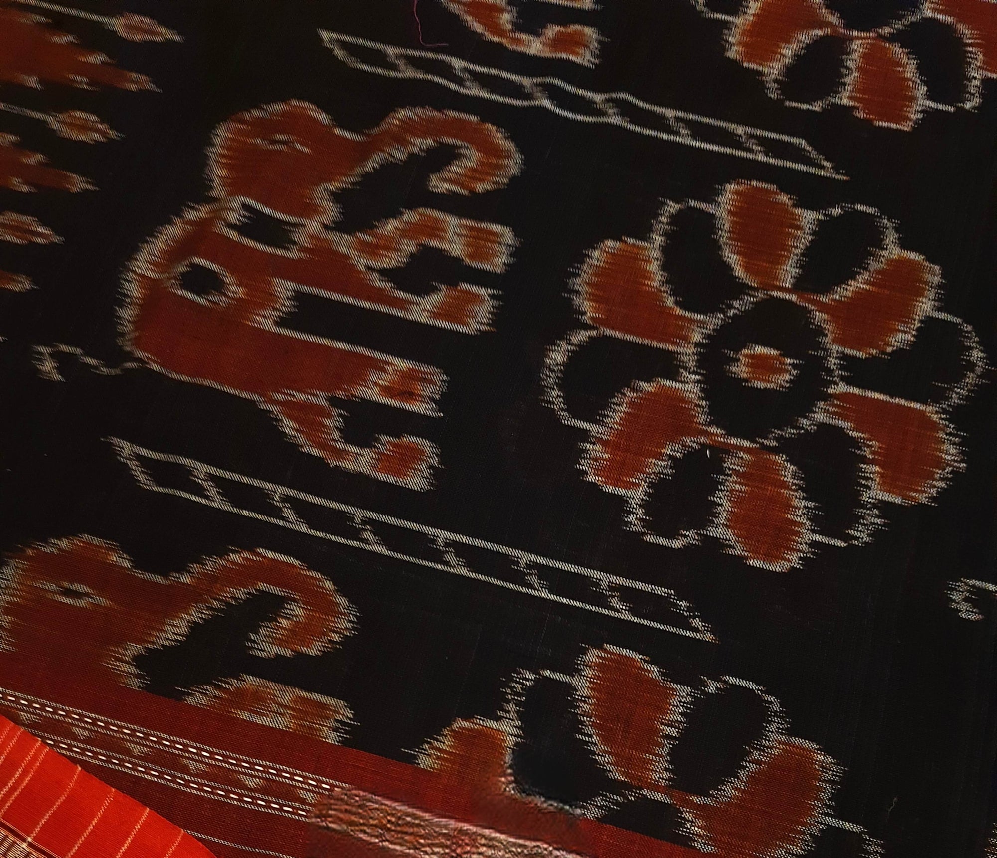 Black Cotton ikat Dupatta with elephant and flower motifs woven