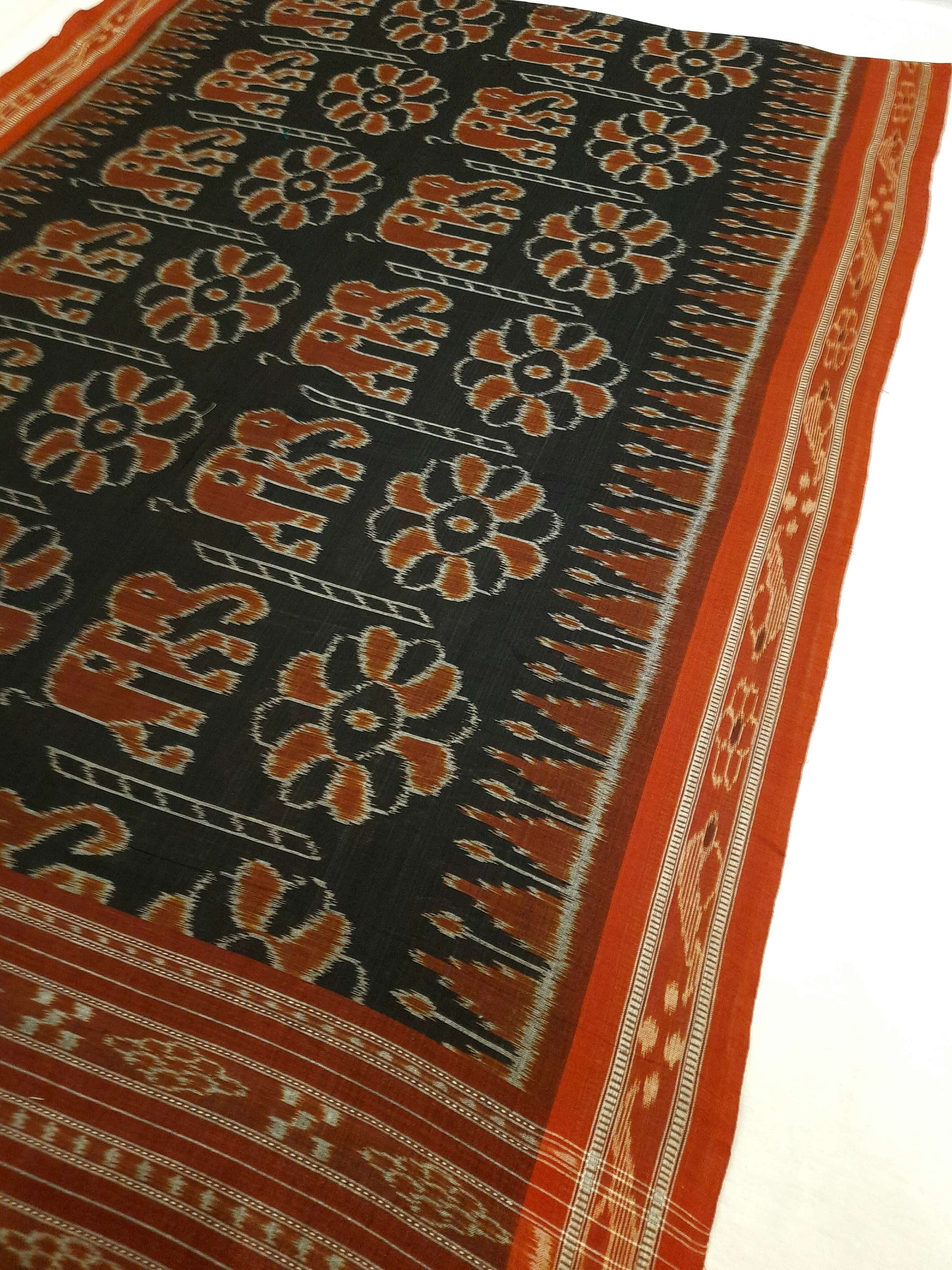 Black Cotton ikat Dupatta with elephant and flower motifs woven