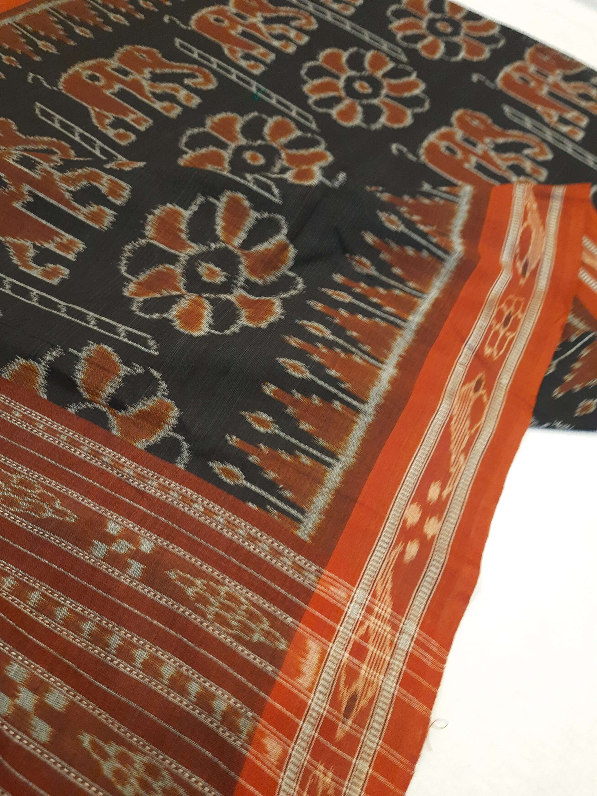 Black Cotton ikat Dupatta with elephant and flower motifs woven