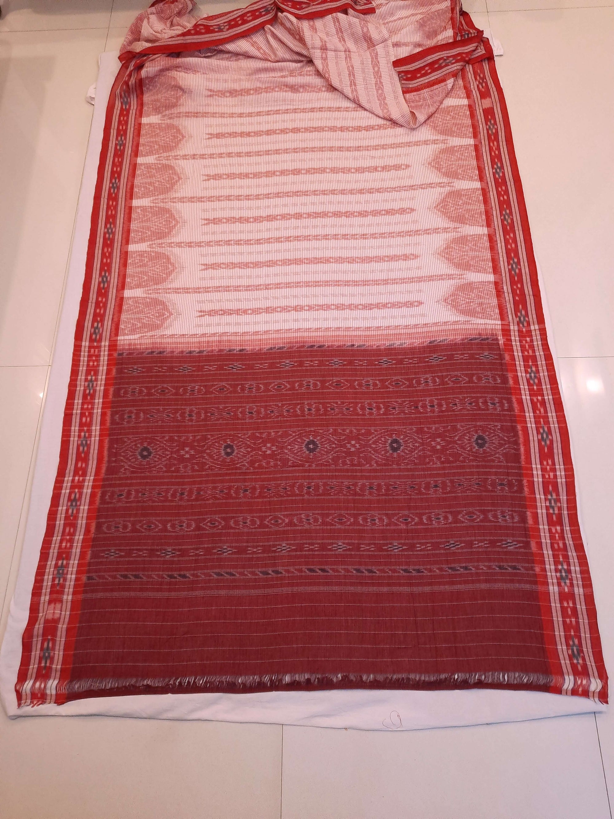 Off-white with Red Cotton Odisha Ikat saree with cotton ikat blouse piece