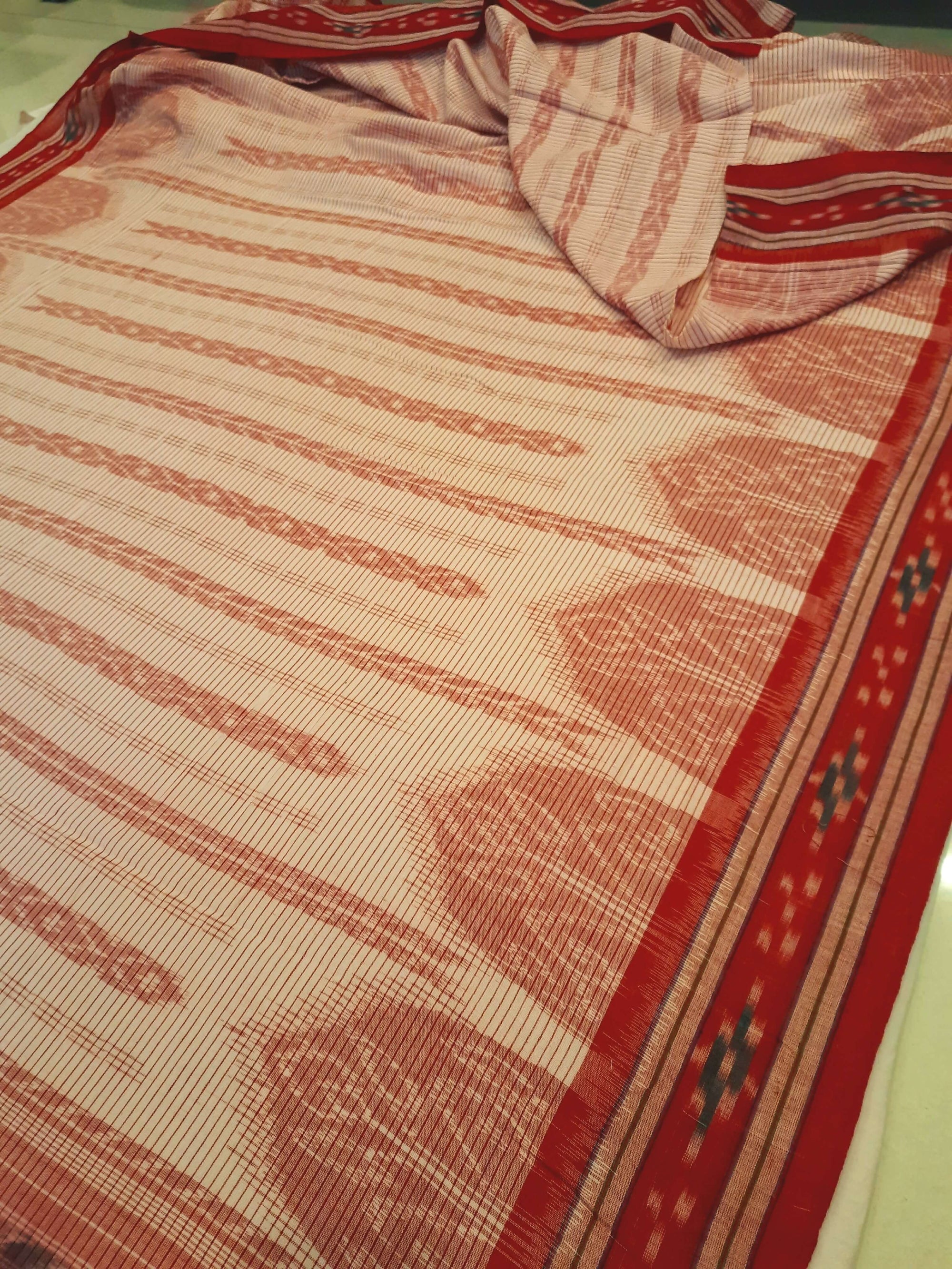 Off-white with Red Cotton Odisha Ikat saree with cotton ikat blouse piece