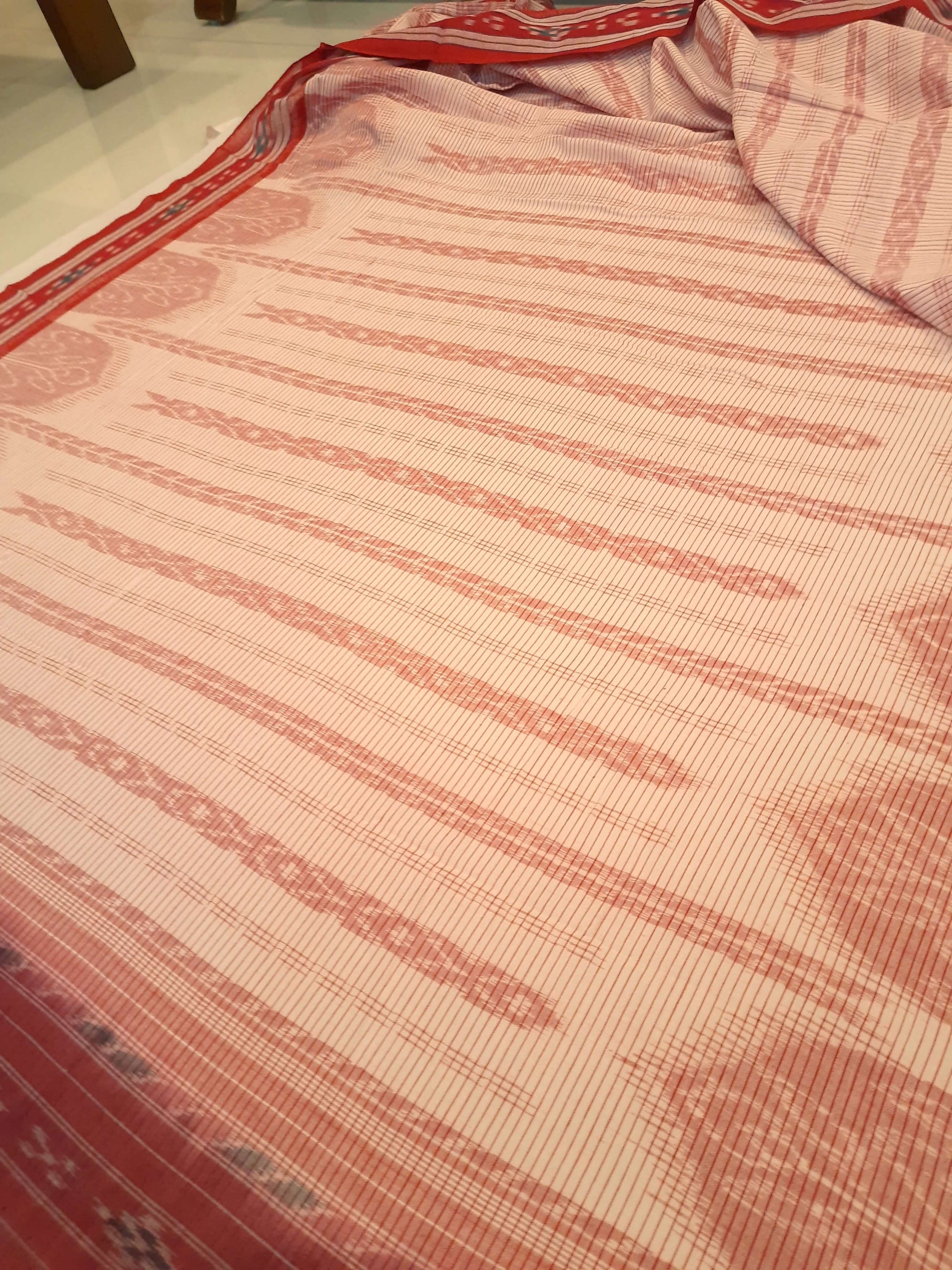 Off-white with Red Cotton Odisha Ikat saree with cotton ikat blouse piece