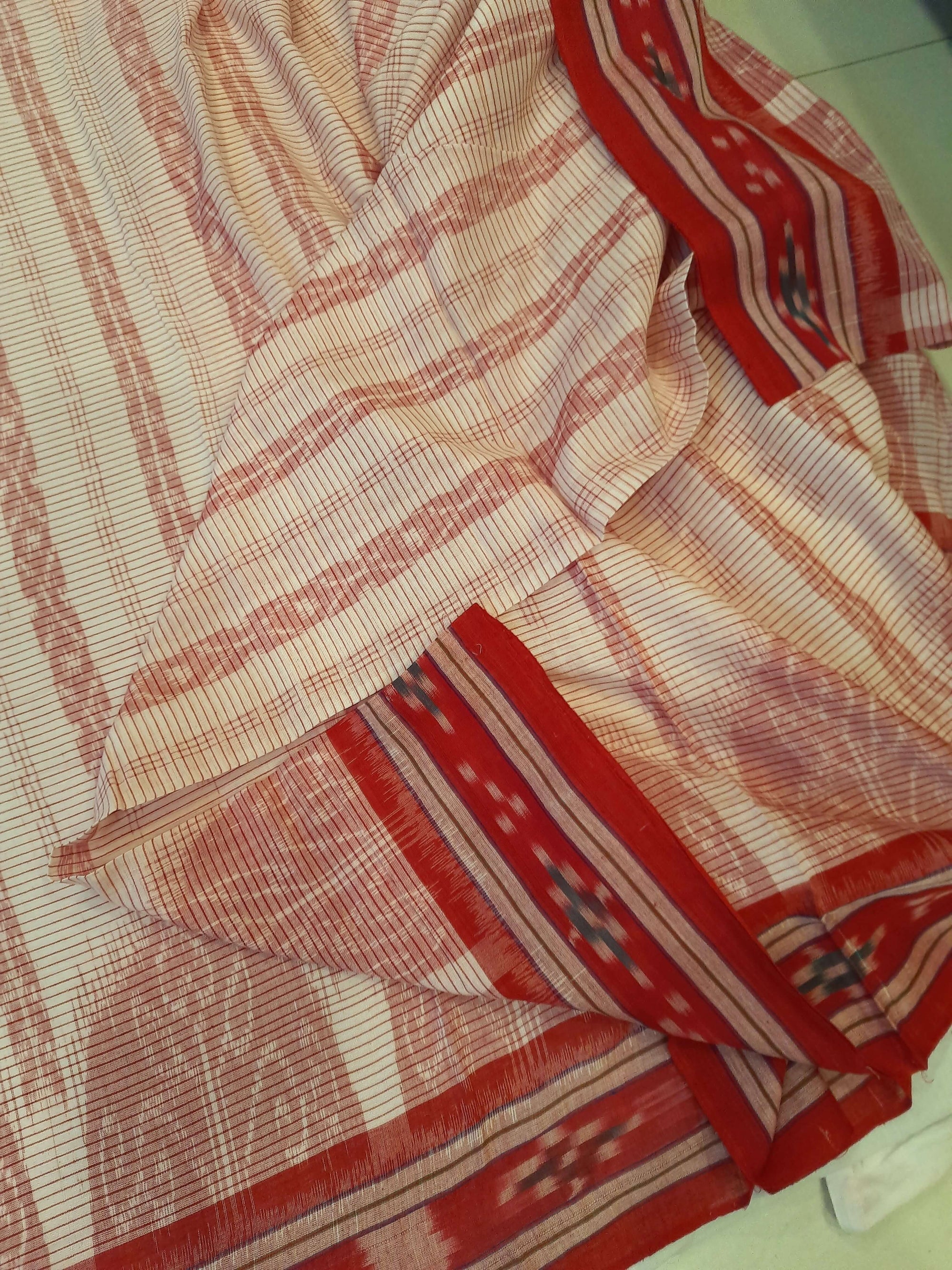 Off-white with Red Cotton Odisha Ikat saree with cotton ikat blouse piece