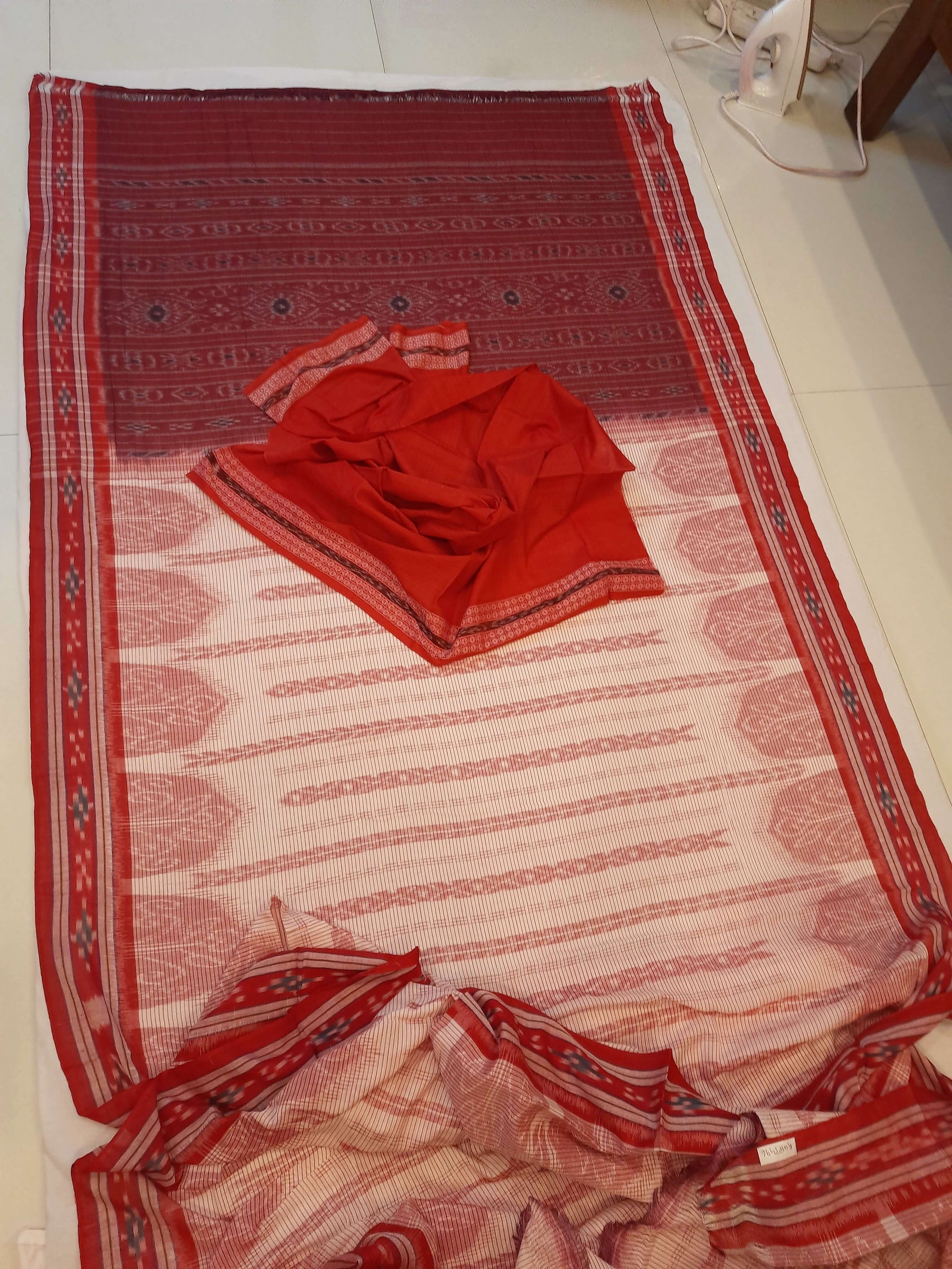 Off-white with Red Cotton Odisha Ikat saree with cotton ikat blouse piece