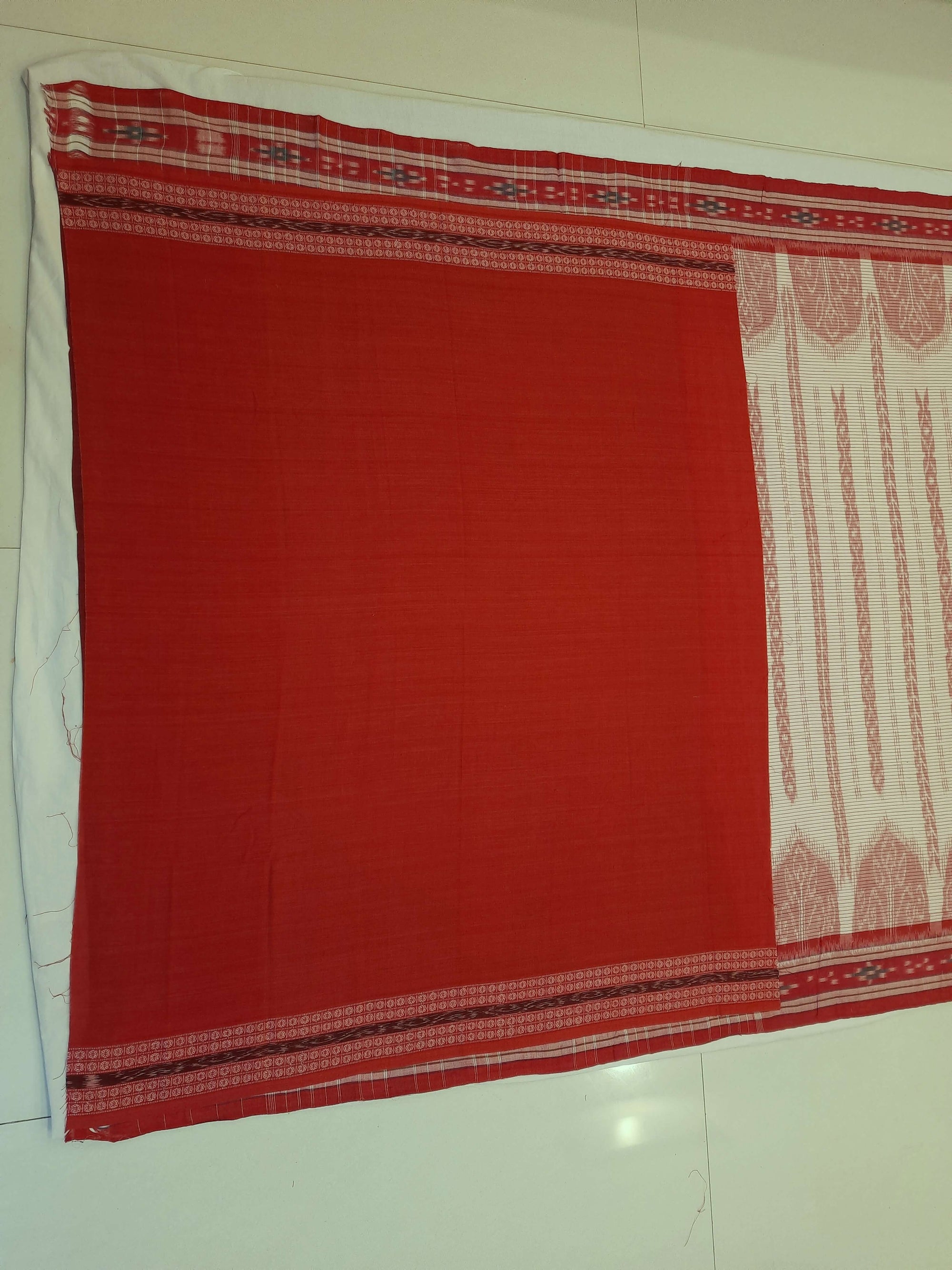 Off-white with Red Cotton Odisha Ikat saree with cotton ikat blouse piece