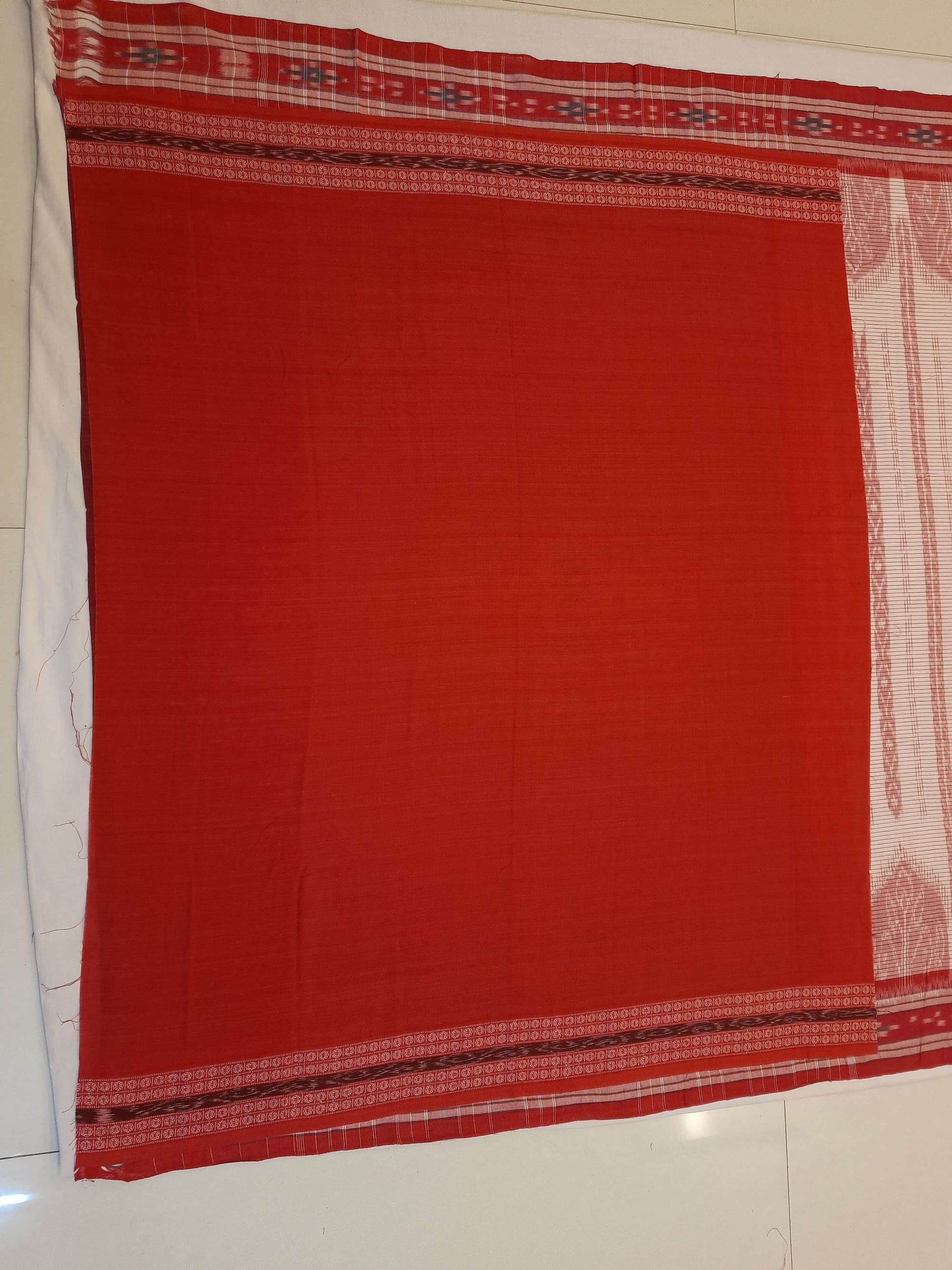 Off-white with Red Cotton Odisha Ikat saree with cotton ikat blouse piece