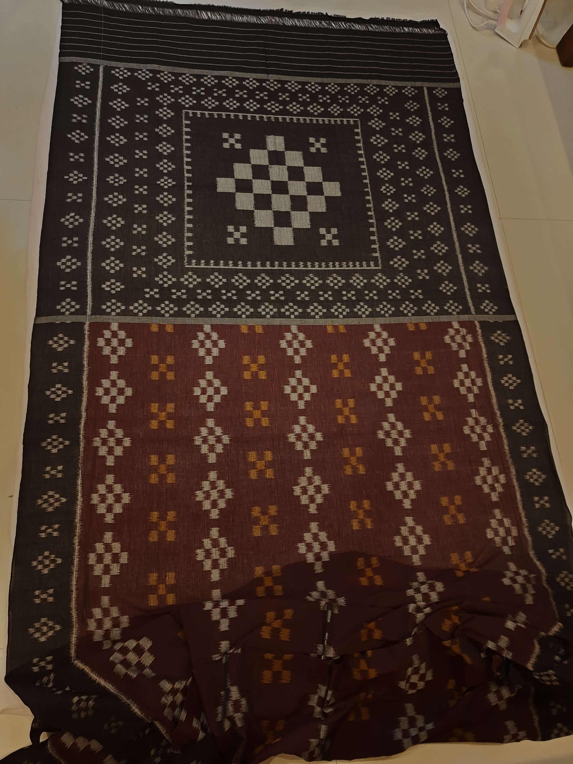 Brown Cotton Odisha Ikat saree with cotton ikat blouse piece