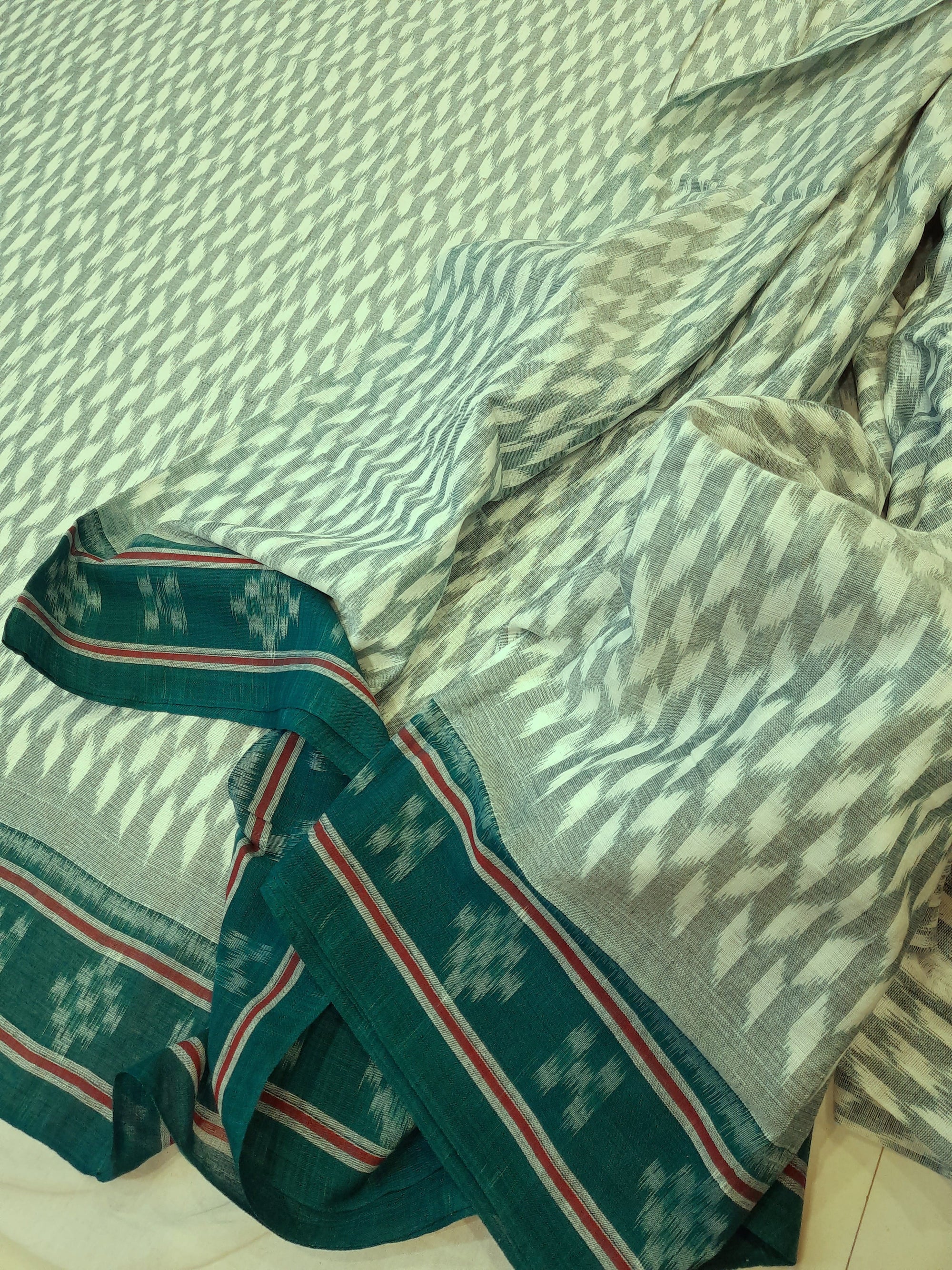 White with Green Cotton Odisha Ikat saree with mix match cotton ikat blouse piece