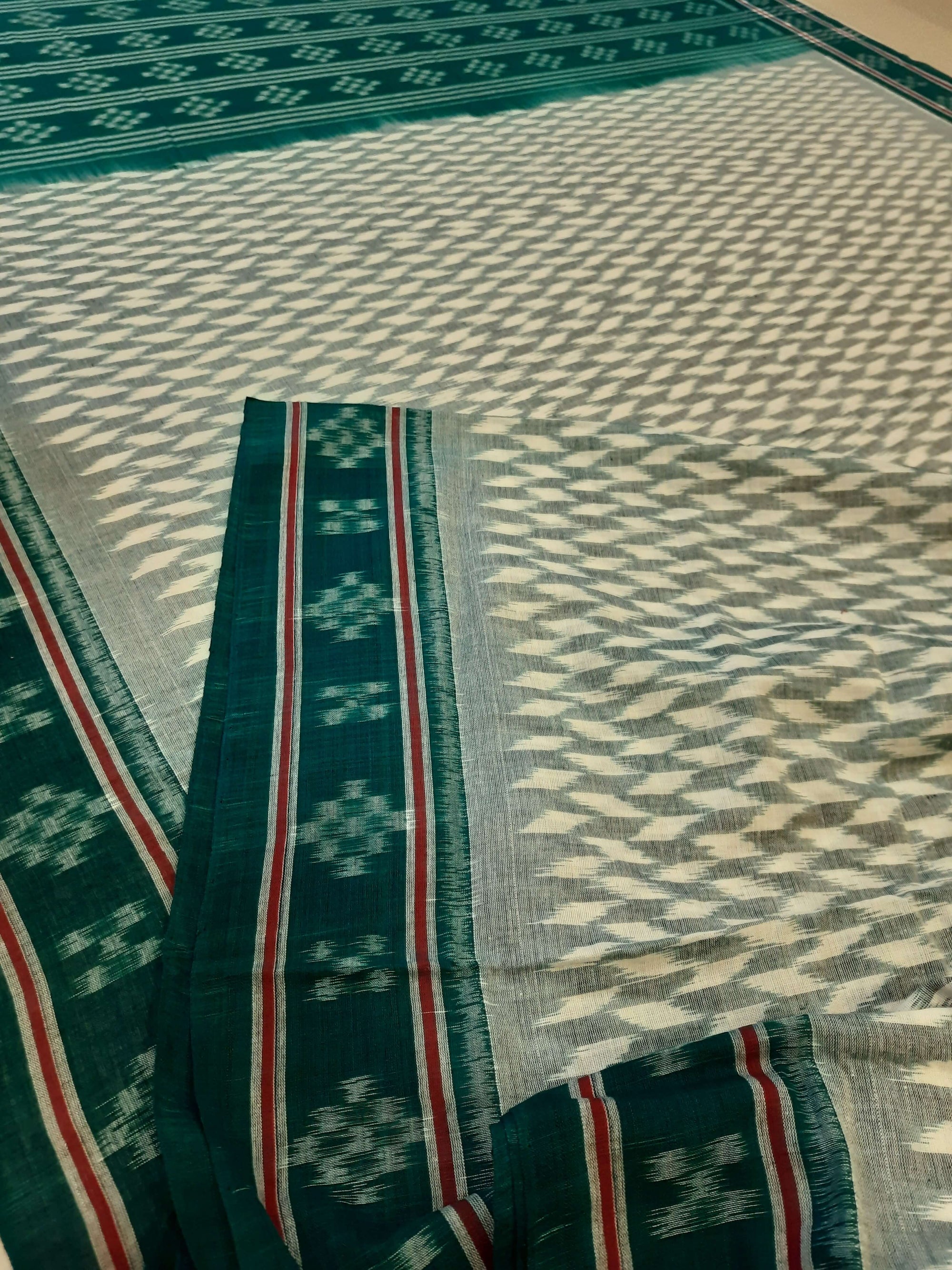 White with Green Cotton Odisha Ikat saree with mix match cotton ikat blouse piece