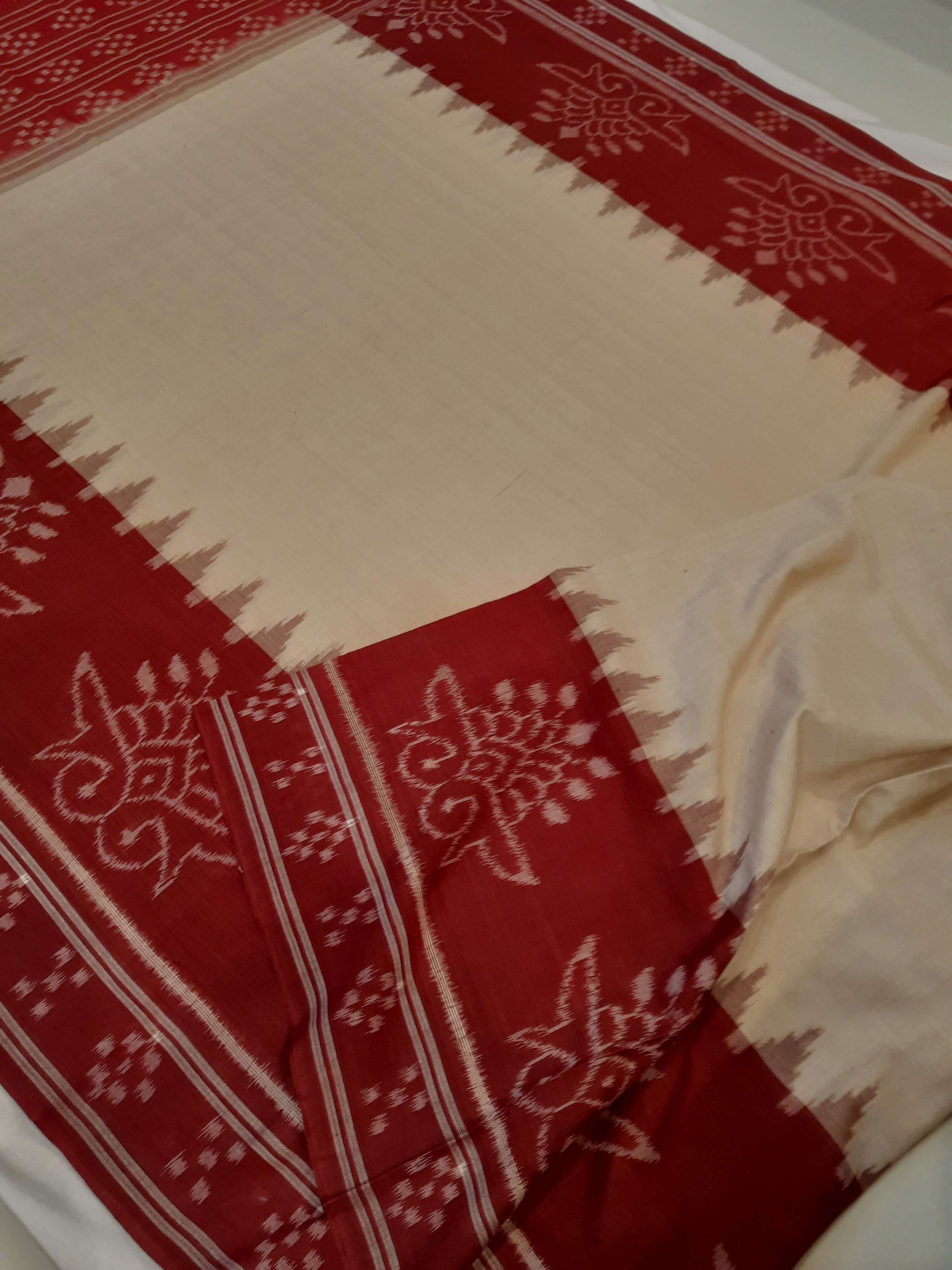 Beige and Maroon wide border Cotton Odisha Ikat saree with cotton ikat blouse piece