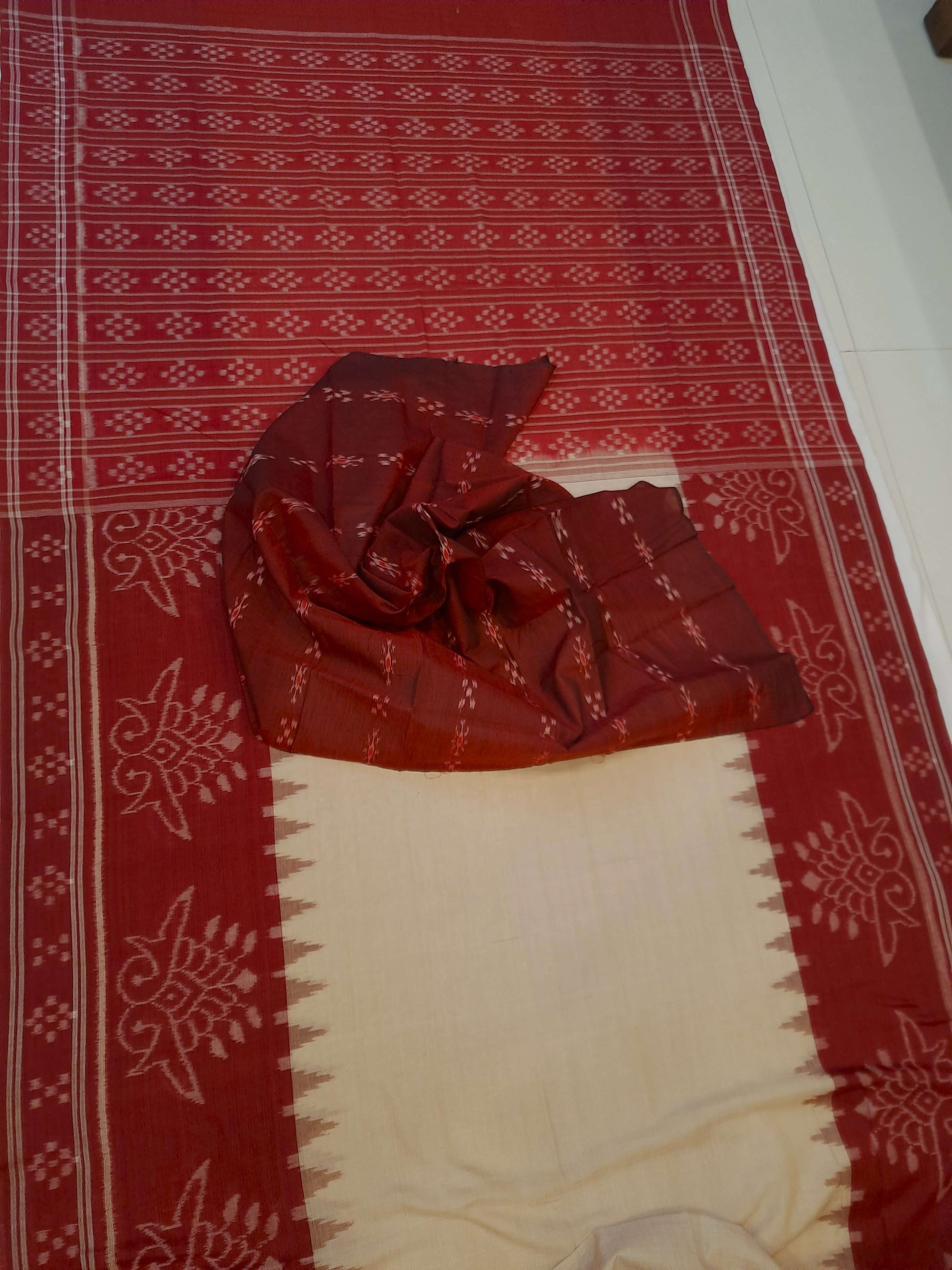 Beige and Maroon wide border Cotton Odisha Ikat saree with cotton ikat blouse piece