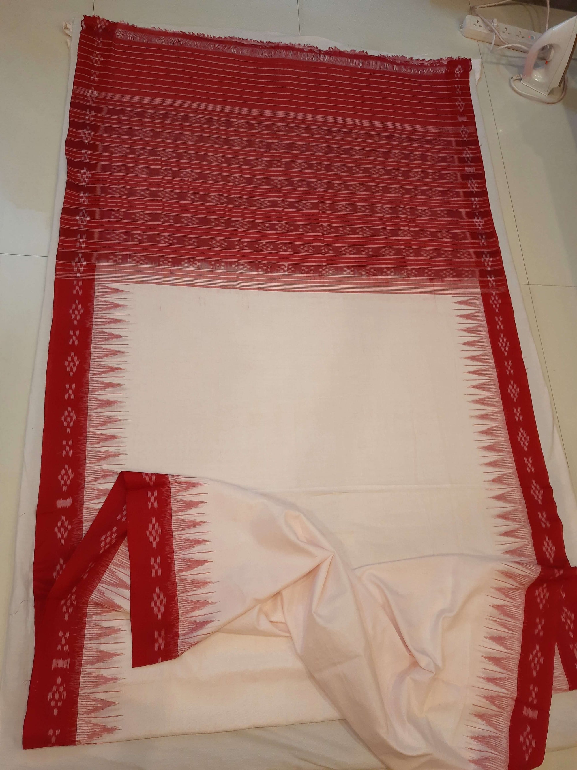 White with Red Cotton Odisha Ikat saree with cotton ikat blouse piece