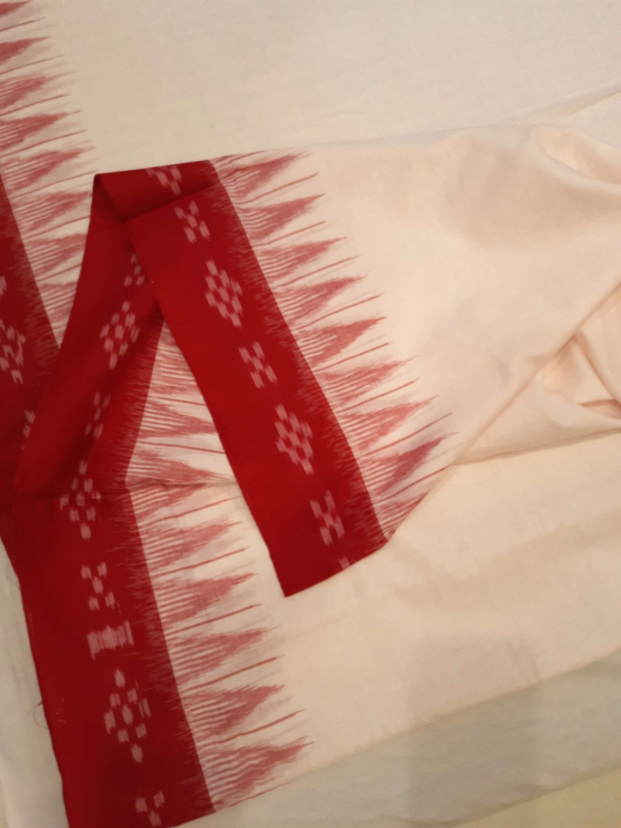 White with Red Cotton Odisha Ikat saree with cotton ikat blouse piece