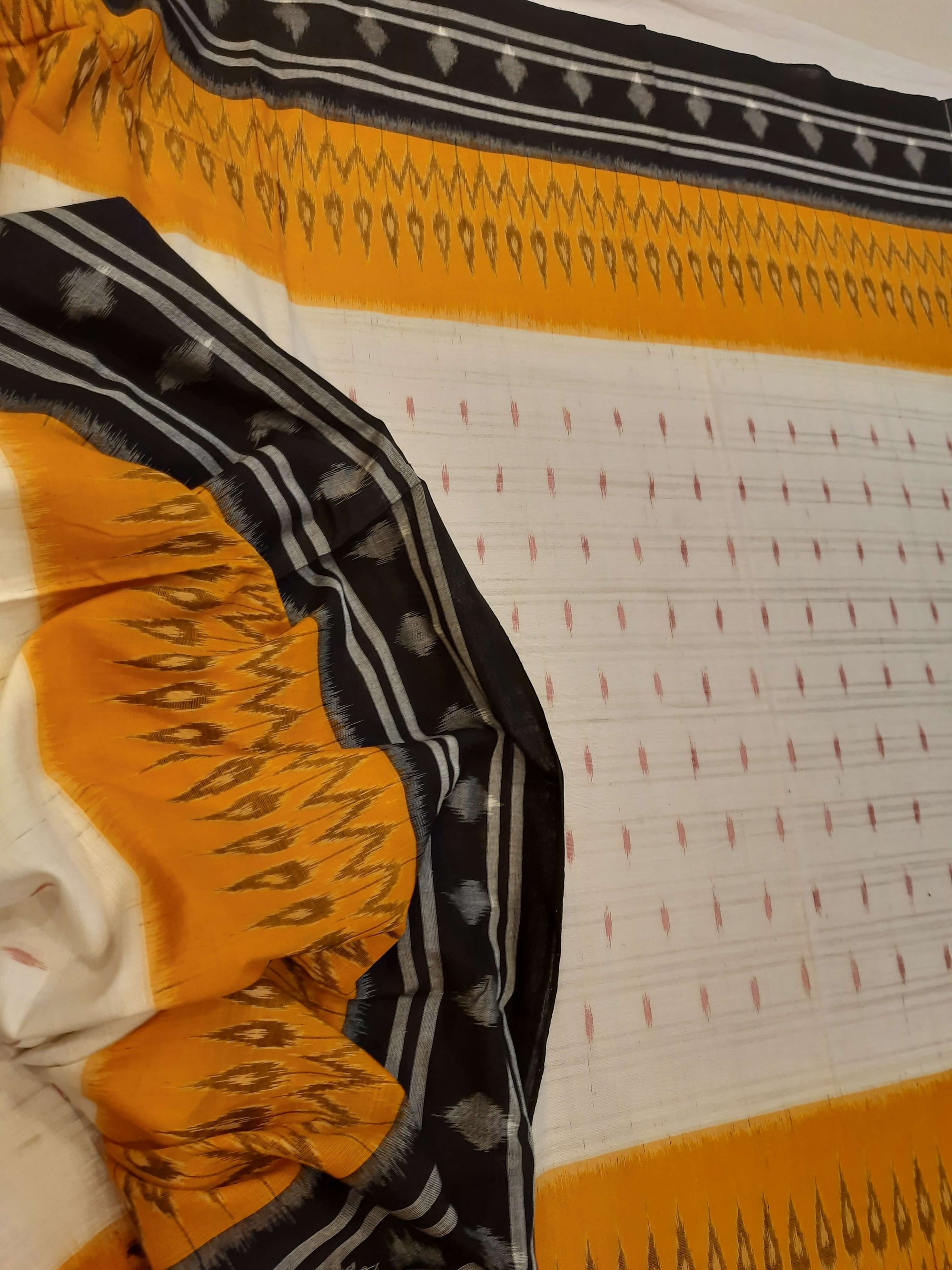 Off-white Cotton Odisha Ikat saree  with mix match cotton ikat blouse piece