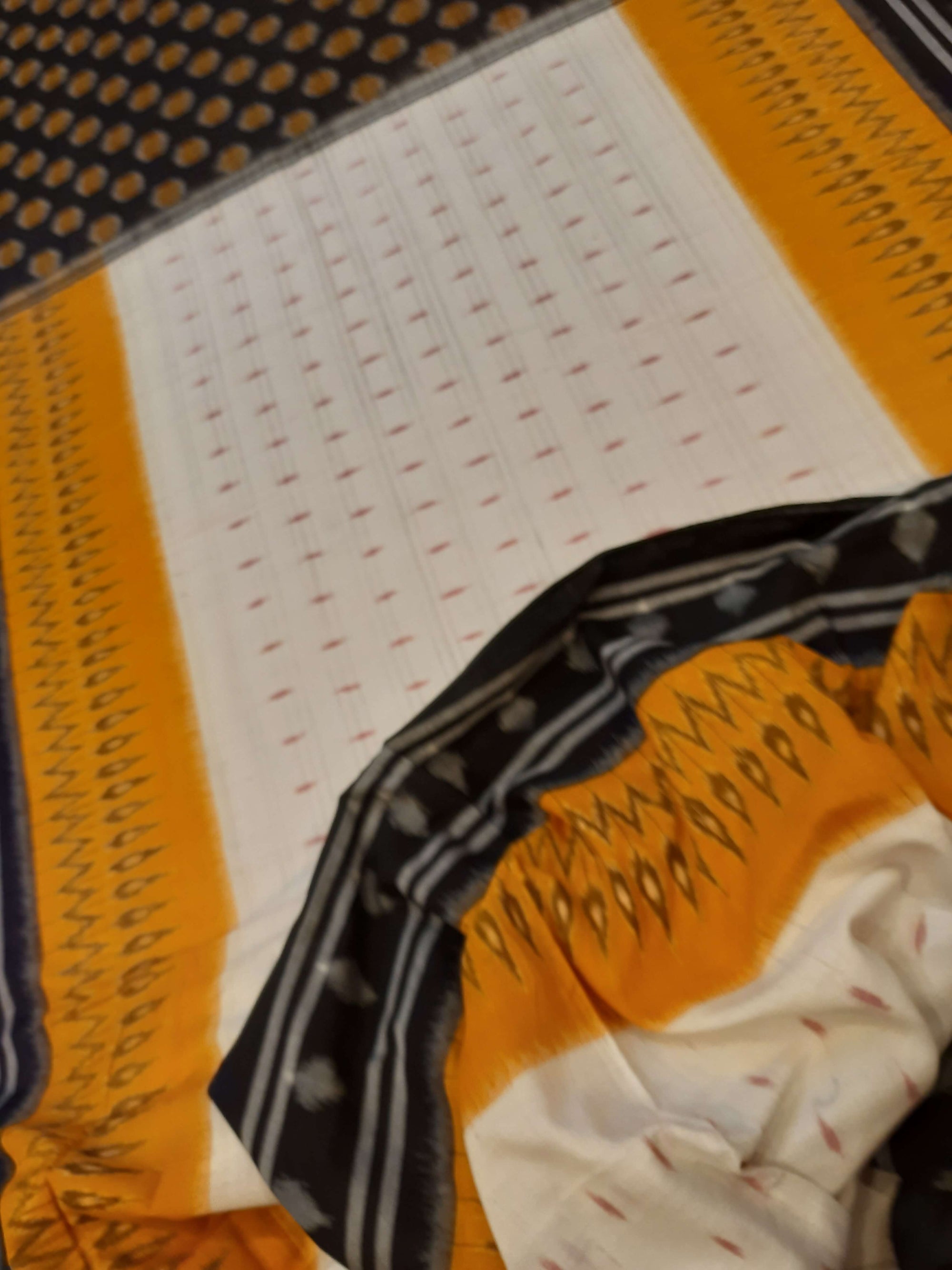 Off-white Cotton Odisha Ikat saree  with mix match cotton ikat blouse piece