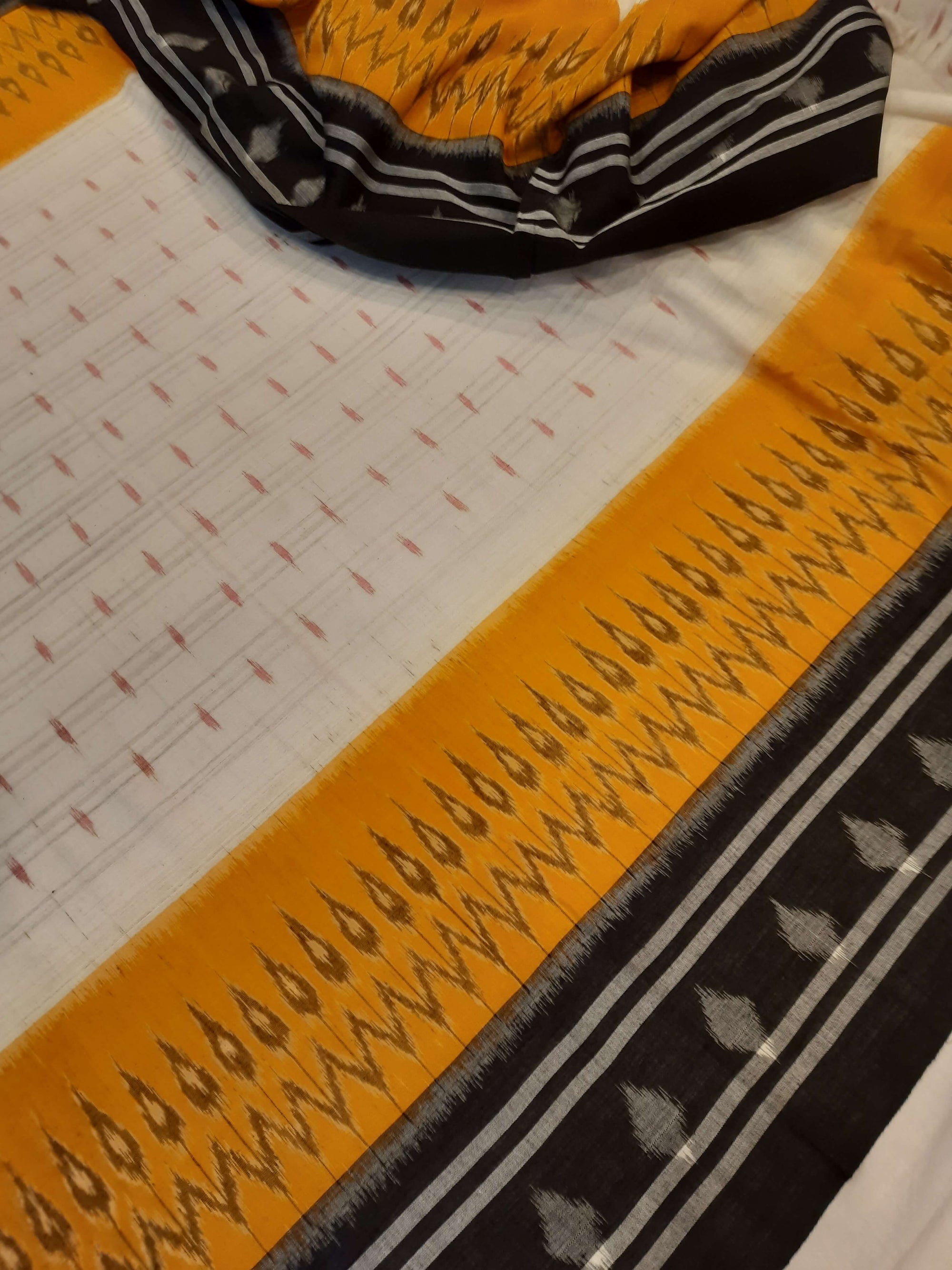 Off-white Cotton Odisha Ikat saree  with mix match cotton ikat blouse piece