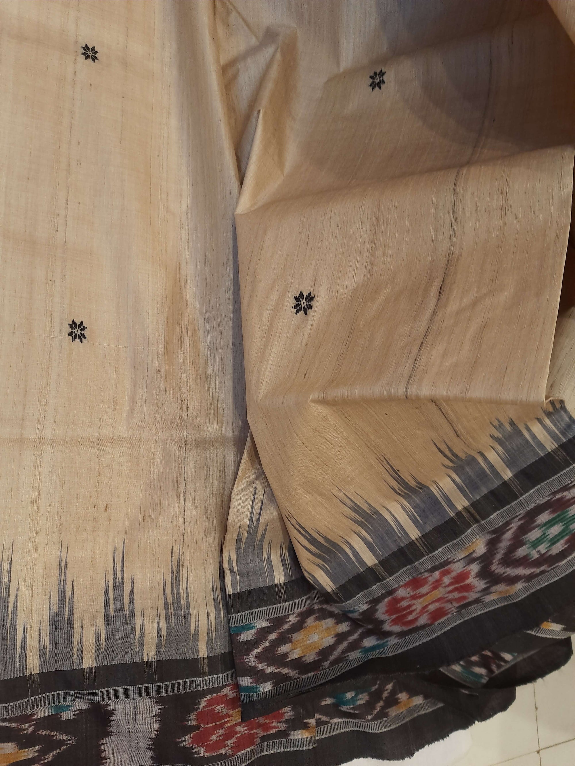 Beige with Black Tussar Silk Odisha Ikat Saree paired with cotton ikat blouse piece