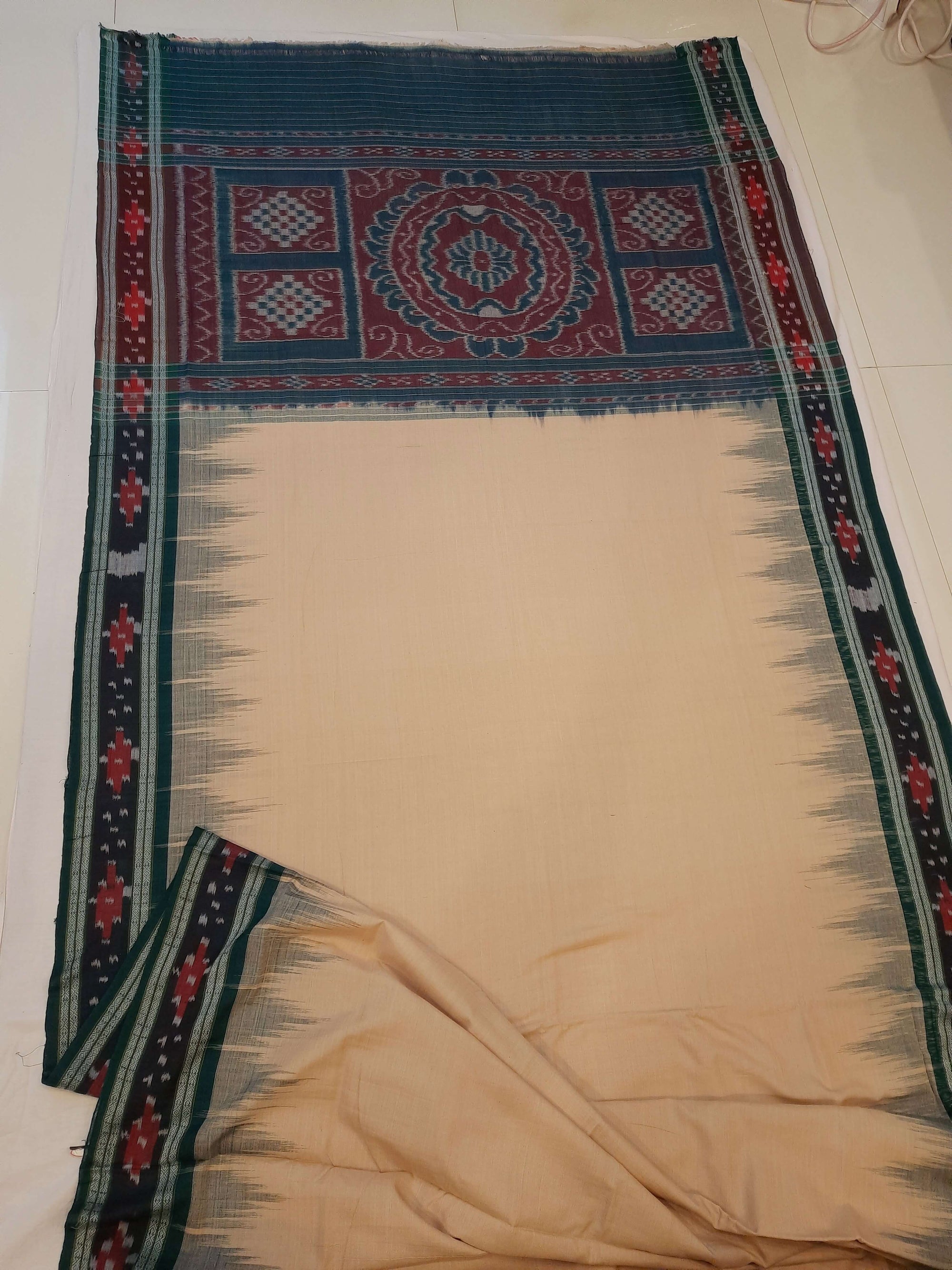 Beige with Green Cotton Odisha Ikat saree with cotton ikat blouse piece