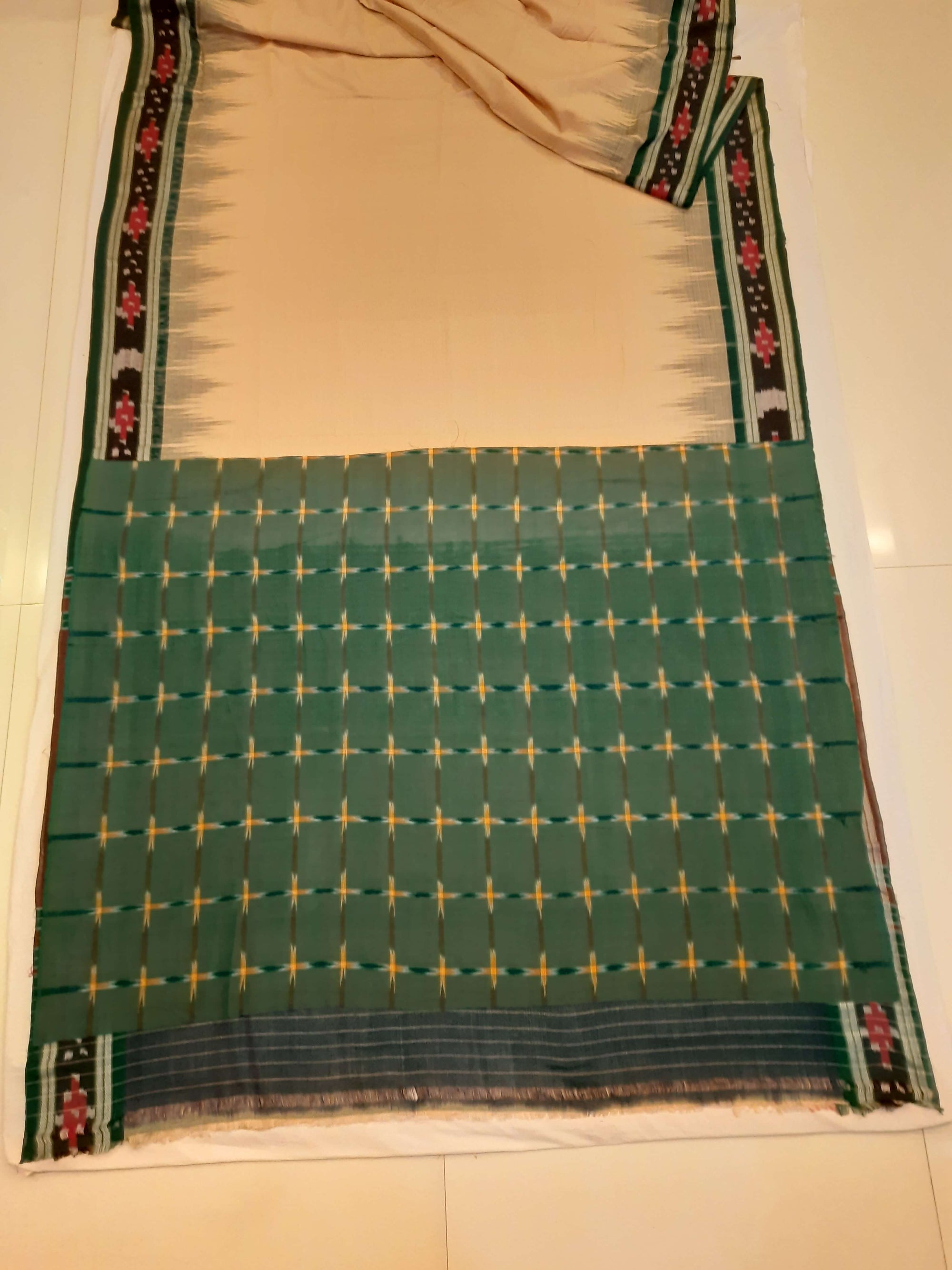 Beige with Green Cotton Odisha Ikat saree with cotton ikat blouse piece