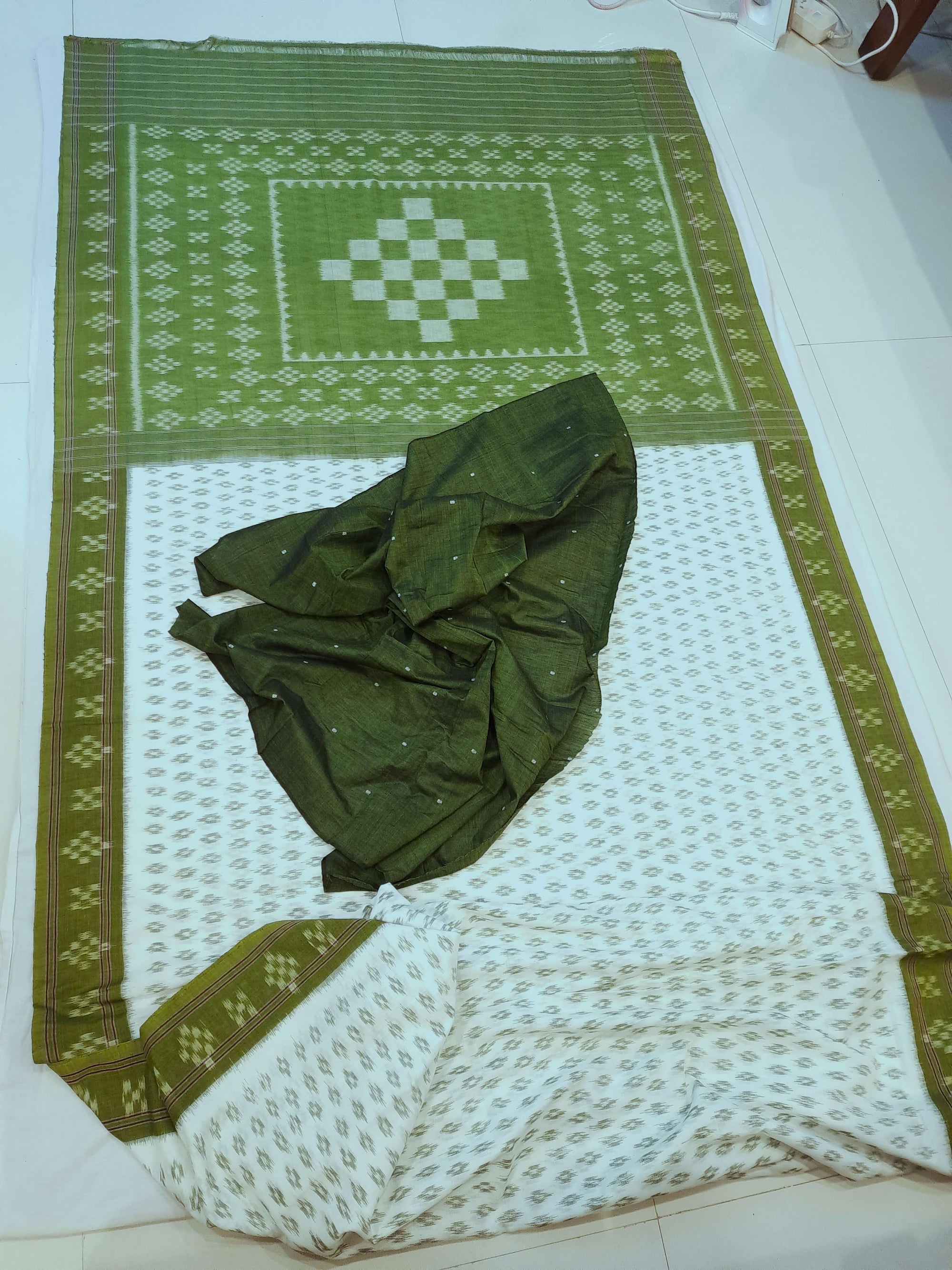 White with Mehendi Green Cotton Odisha Ikat saree with cotton ikat blouse piece