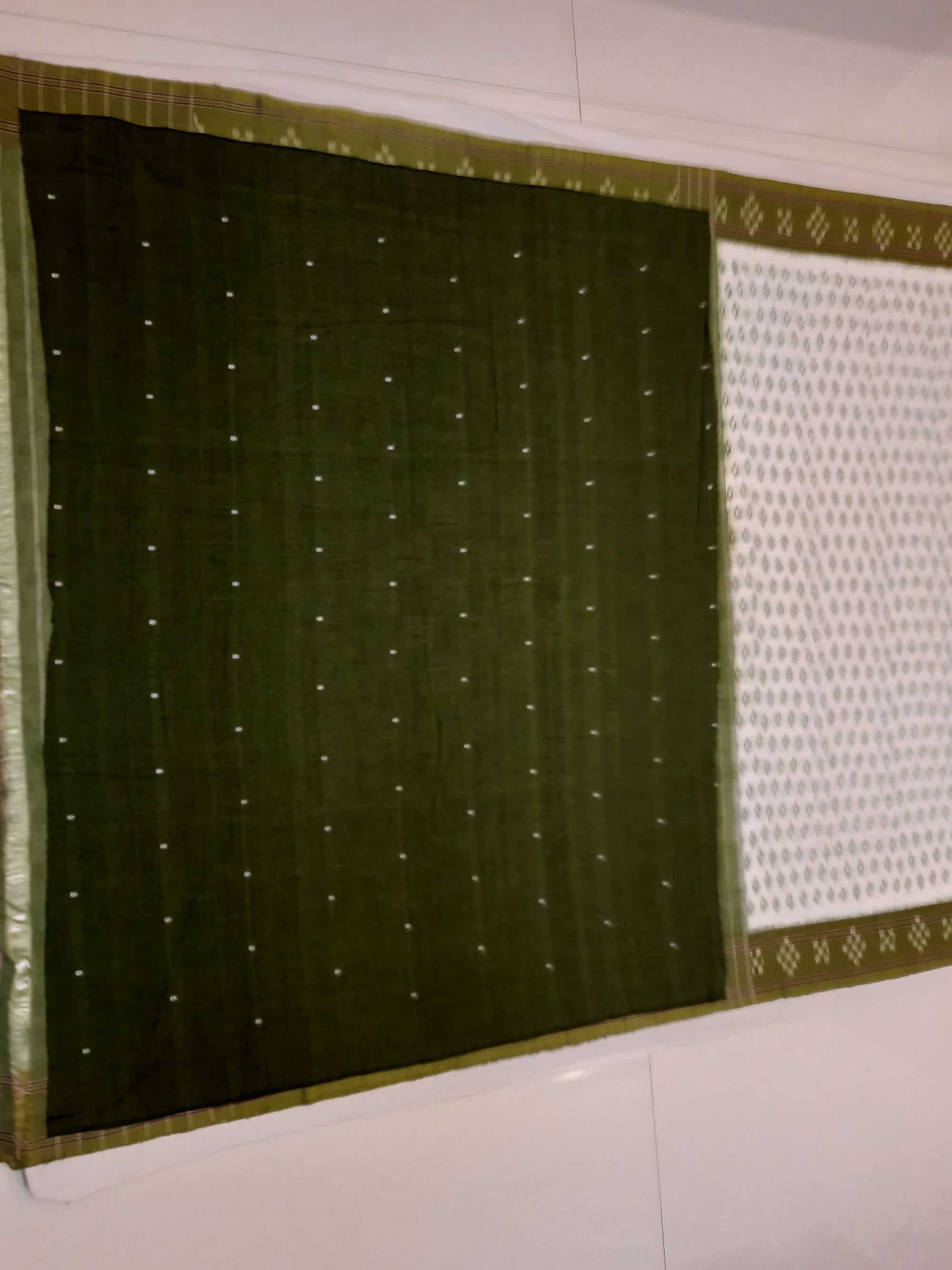 White with Mehendi Green Cotton Odisha Ikat saree with cotton ikat blouse piece