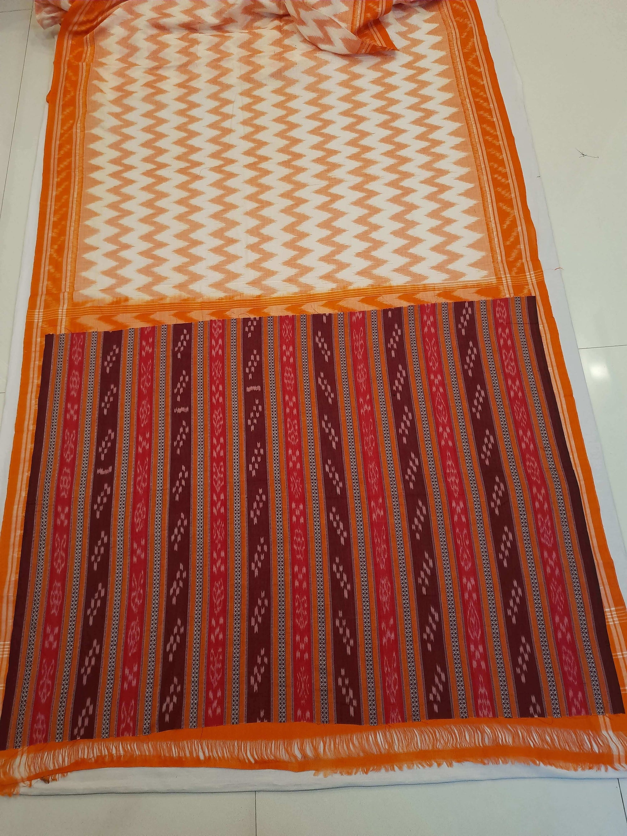Off-white with Orange Cotton Odisha Ikat saree with mix match cotton ikat blouse piece
