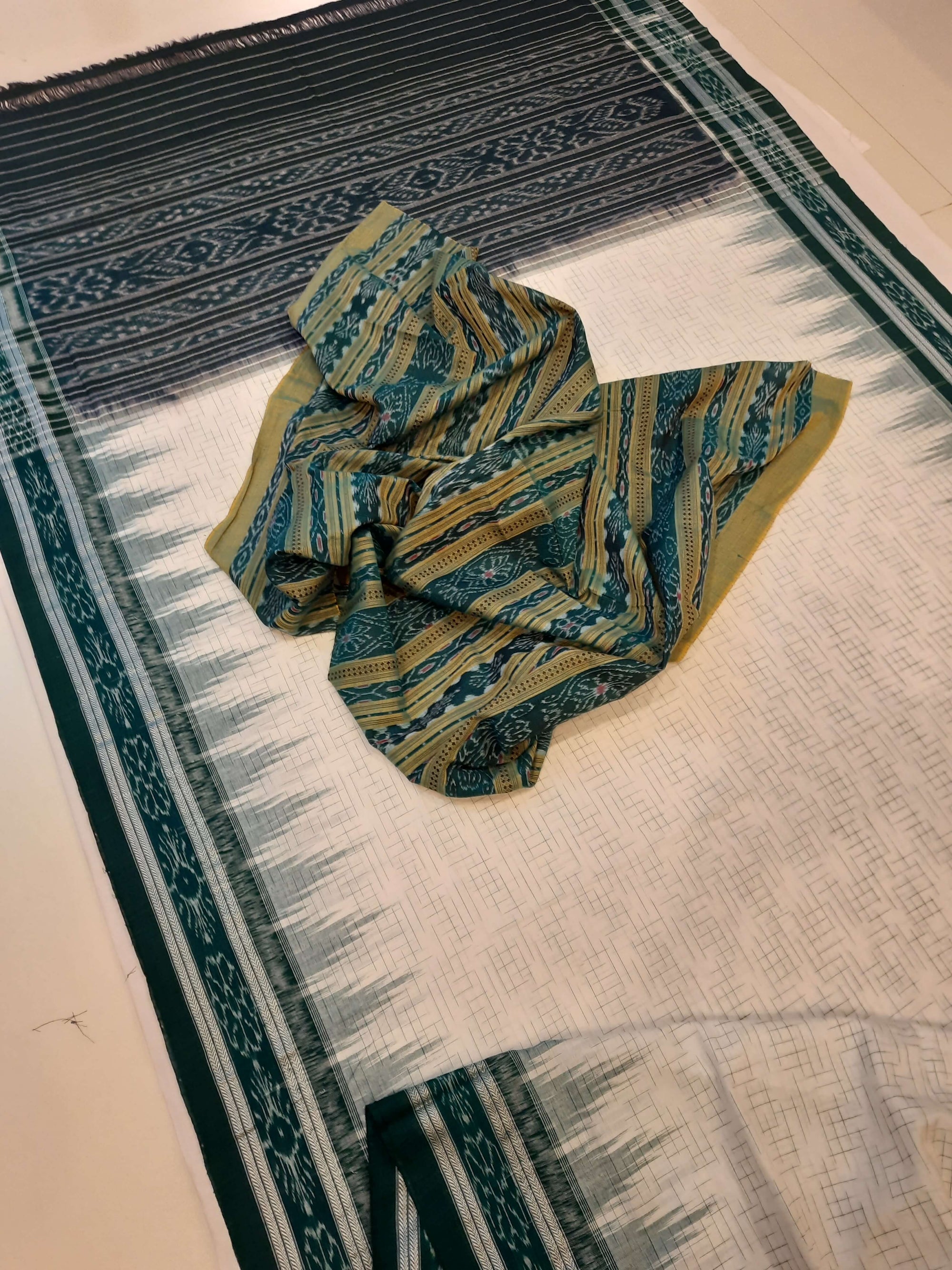 White with Green Cotton Odisha Ikat saree with mix match cotton ikat blouse piece