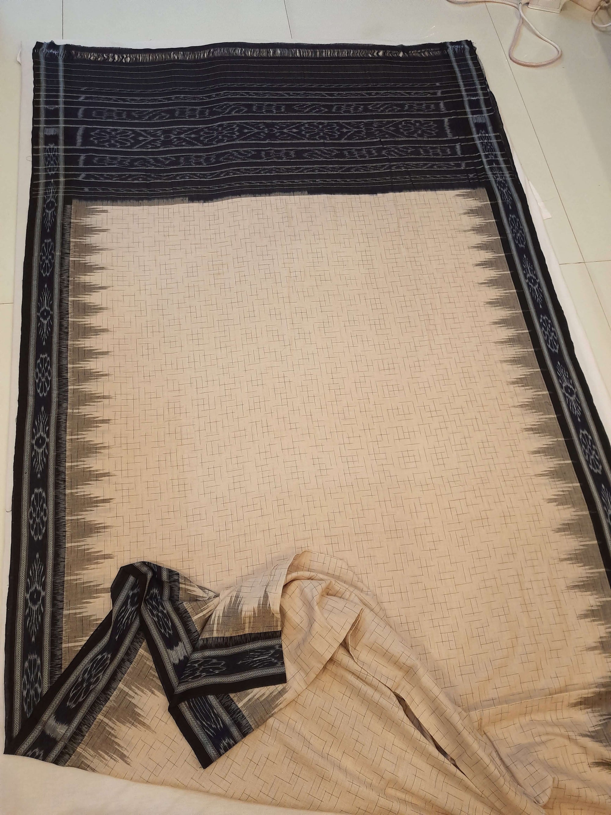 Beige and Black Cotton Odisha Ikat saree with mix match cotton blouse piece