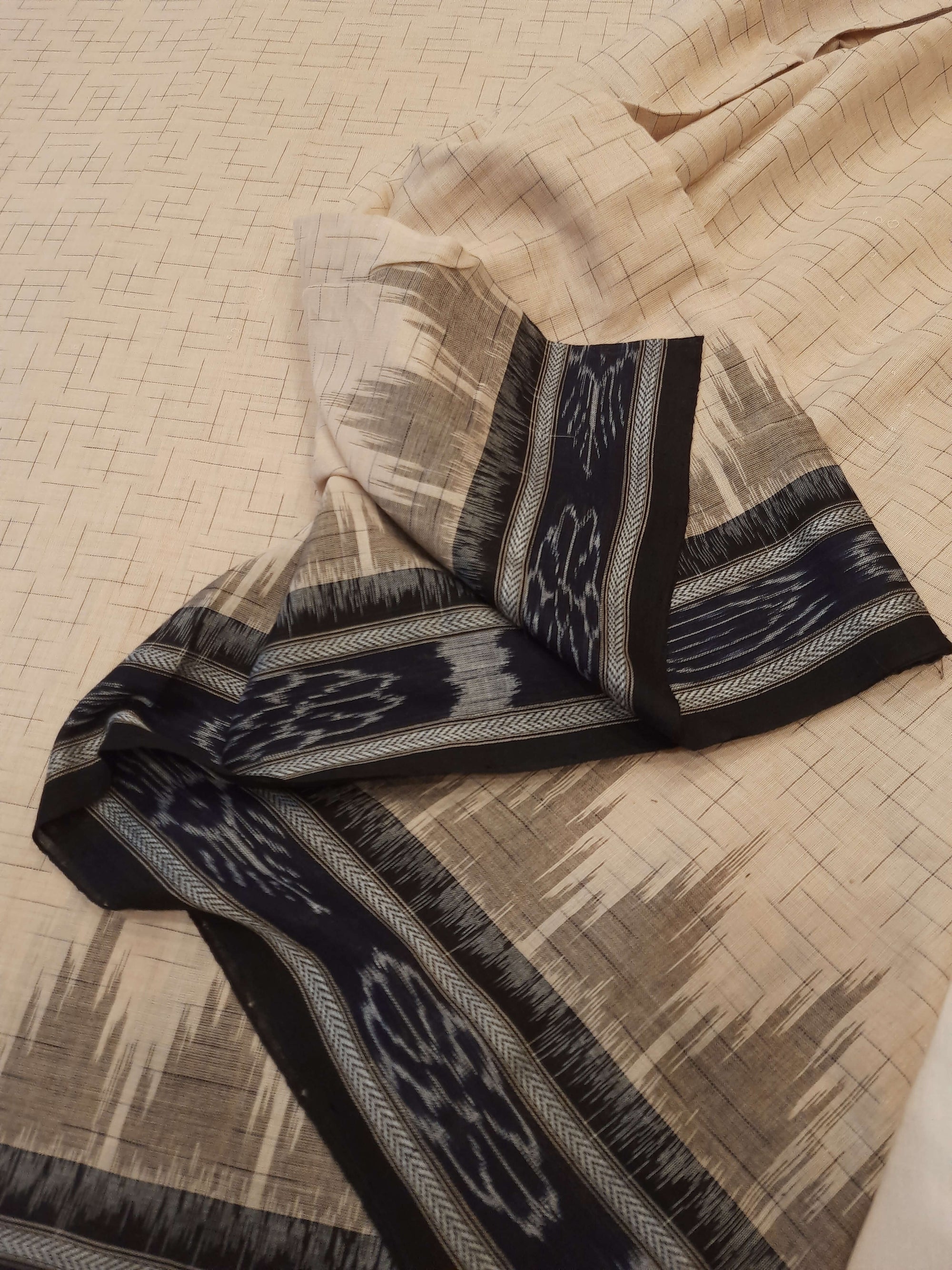 Beige and Black Cotton Odisha Ikat saree with mix match cotton blouse piece