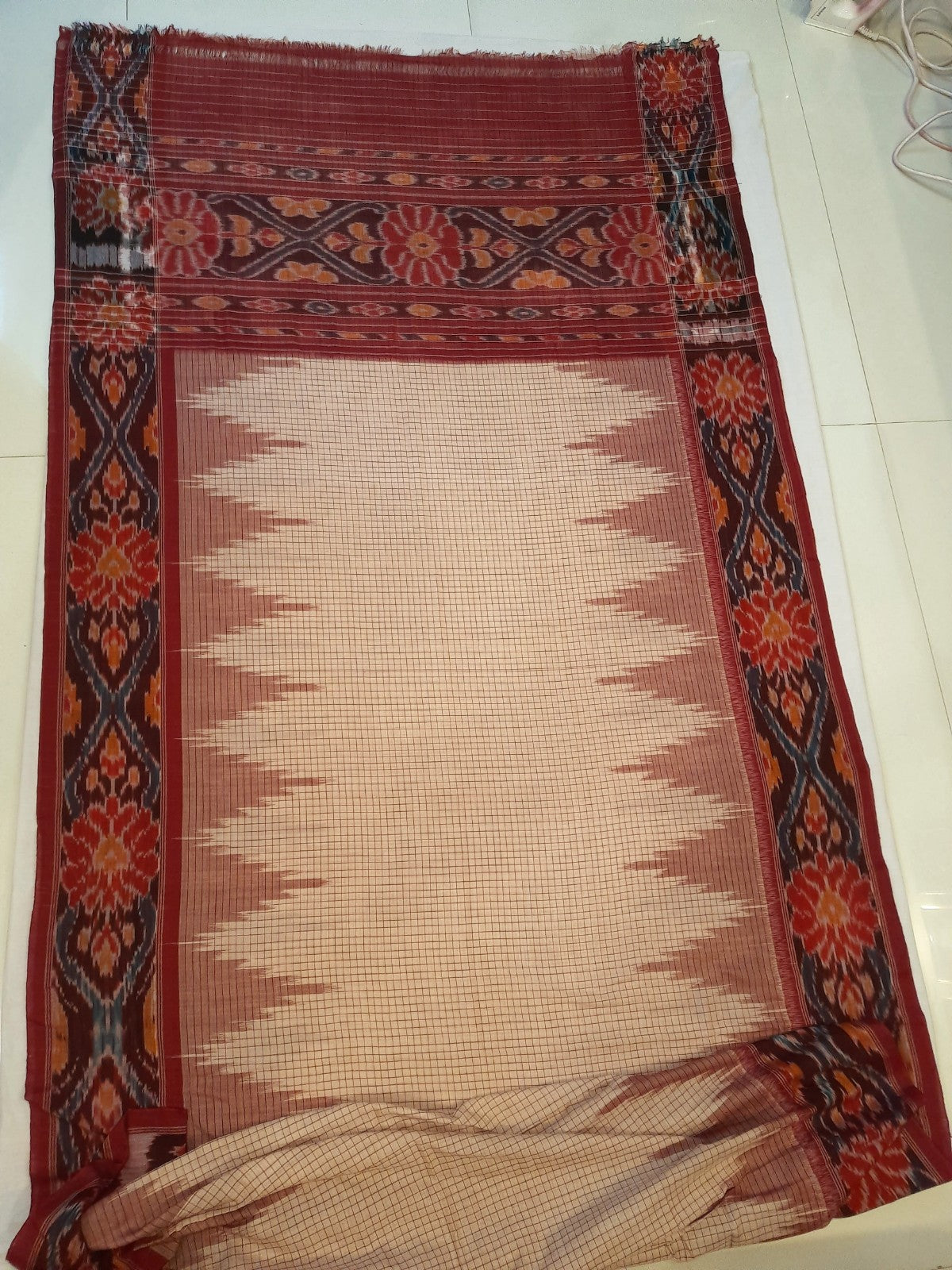 Beige checkered body Cotton Odisha Ikat saree with mix match cotton ikat blouse