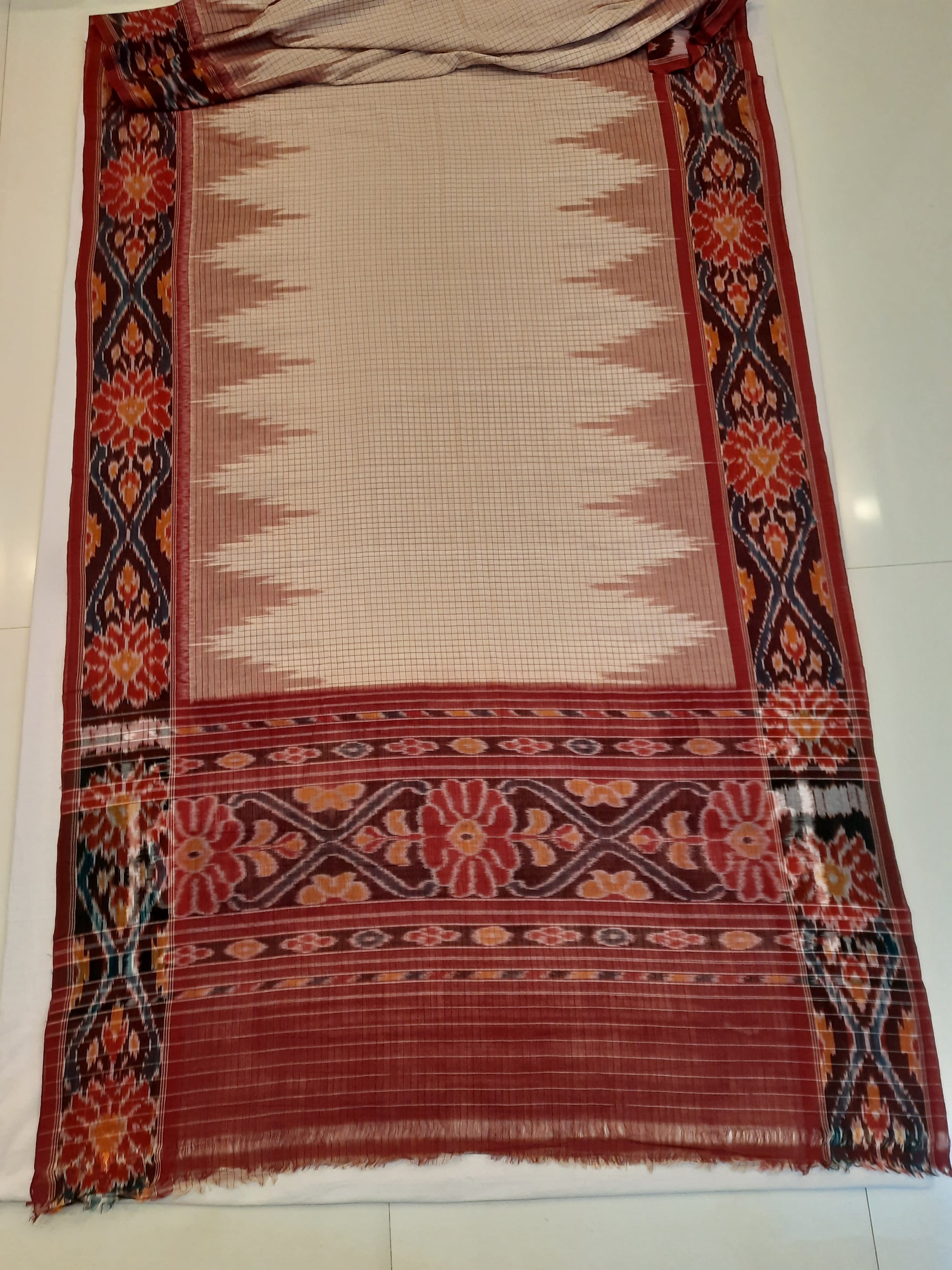 Beige checkered body Cotton Odisha Ikat saree with mix match cotton ikat blouse