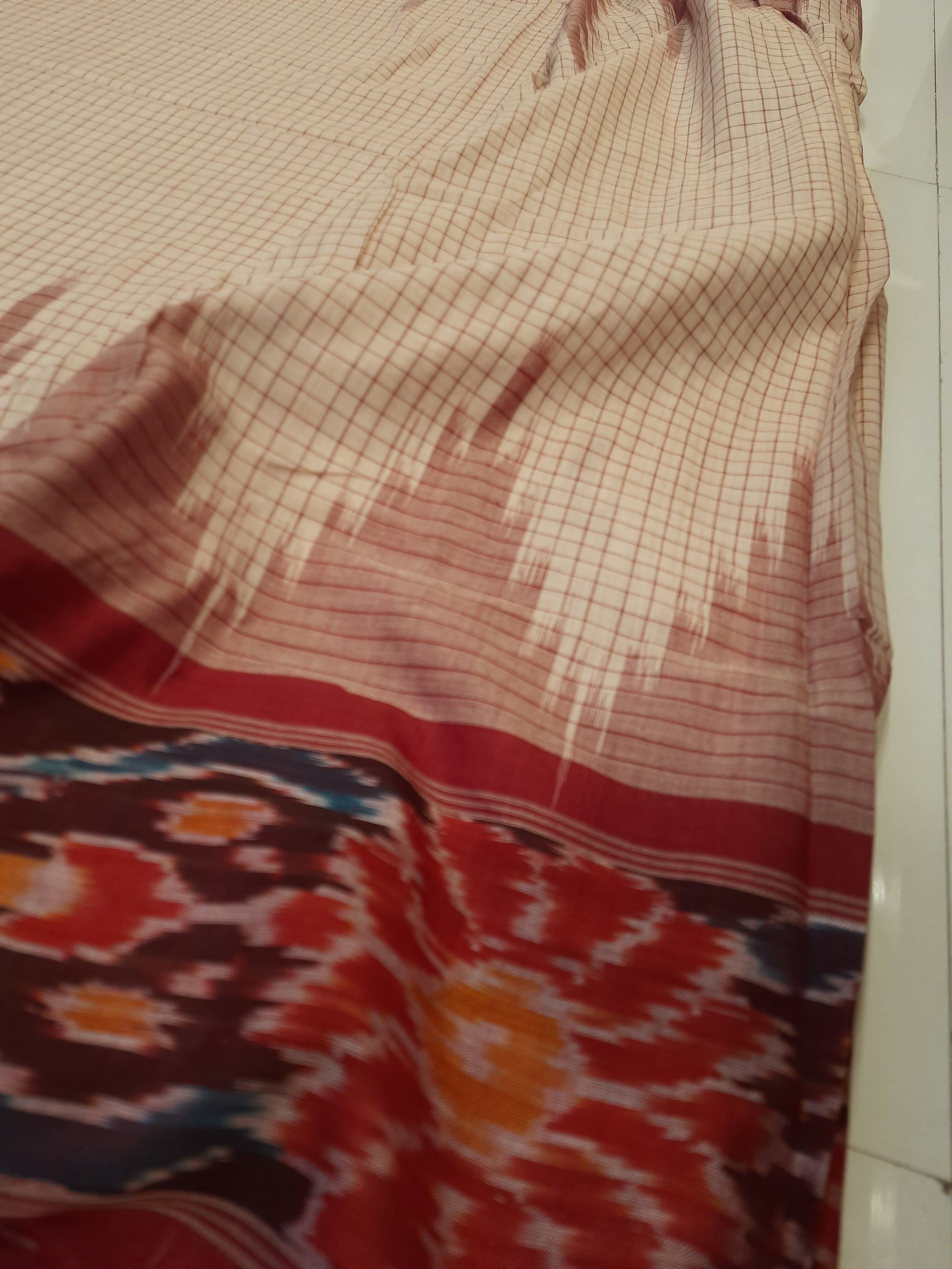 Beige checkered body Cotton Odisha Ikat saree with mix match cotton ikat blouse