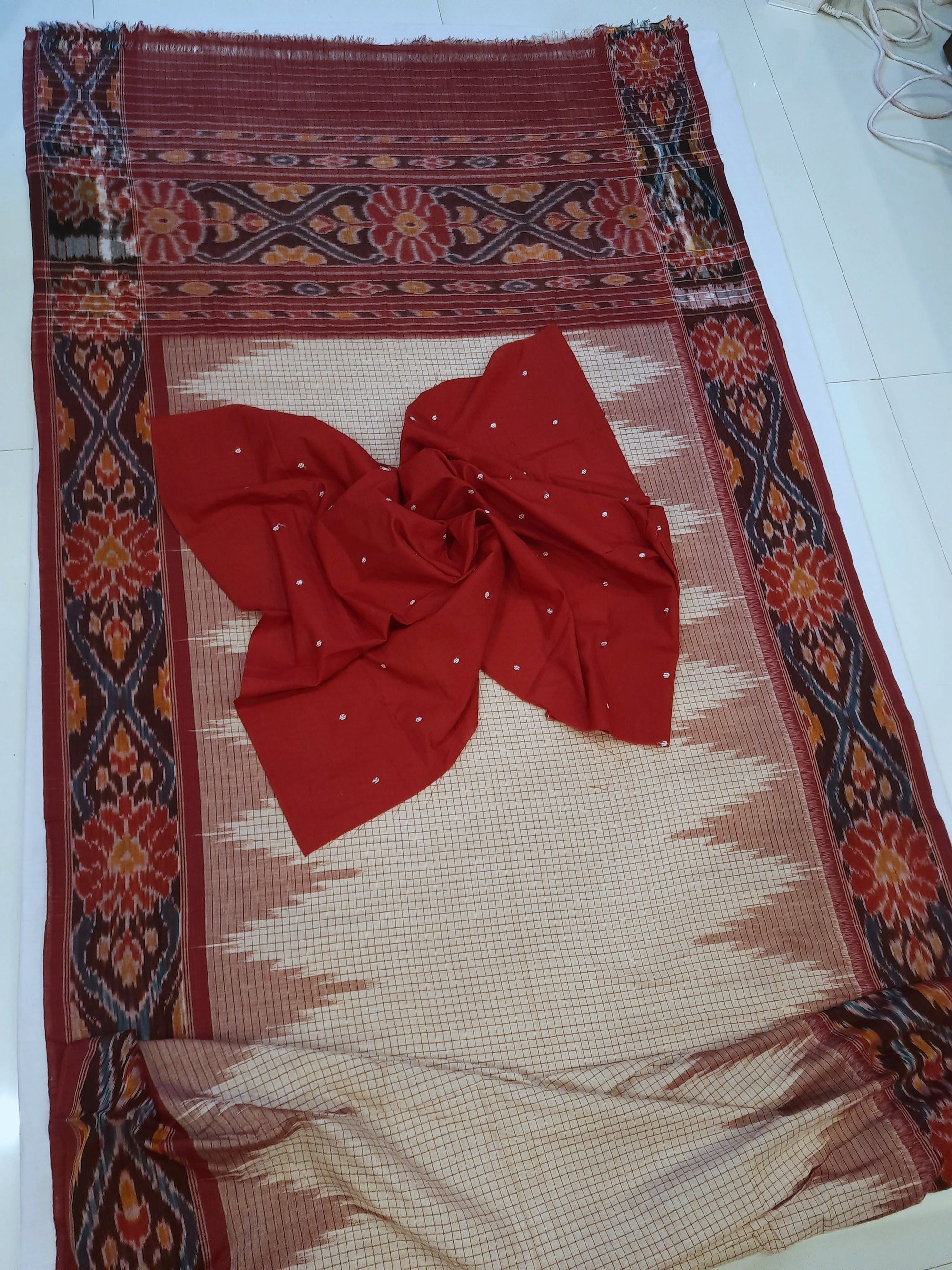 Beige checkered body Cotton Odisha Ikat saree with mix match cotton ikat blouse