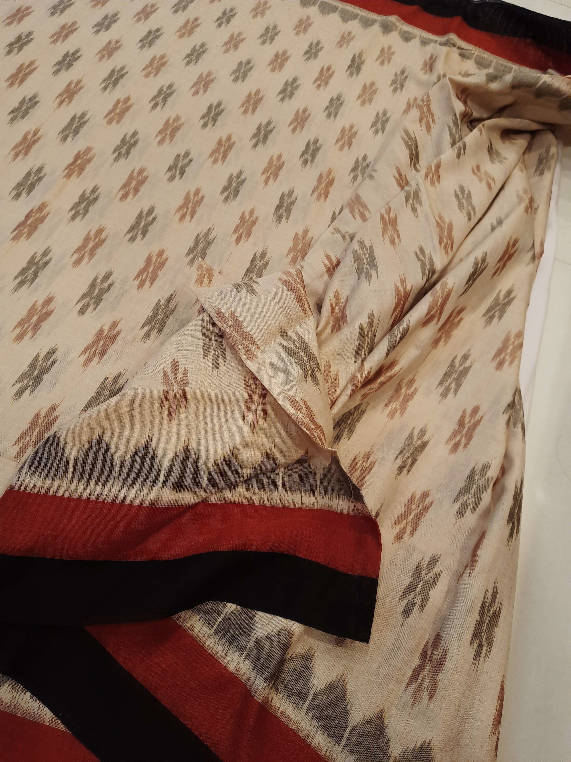 Beige cotton Odisha Ikat saree with cotton ikat blouse piece