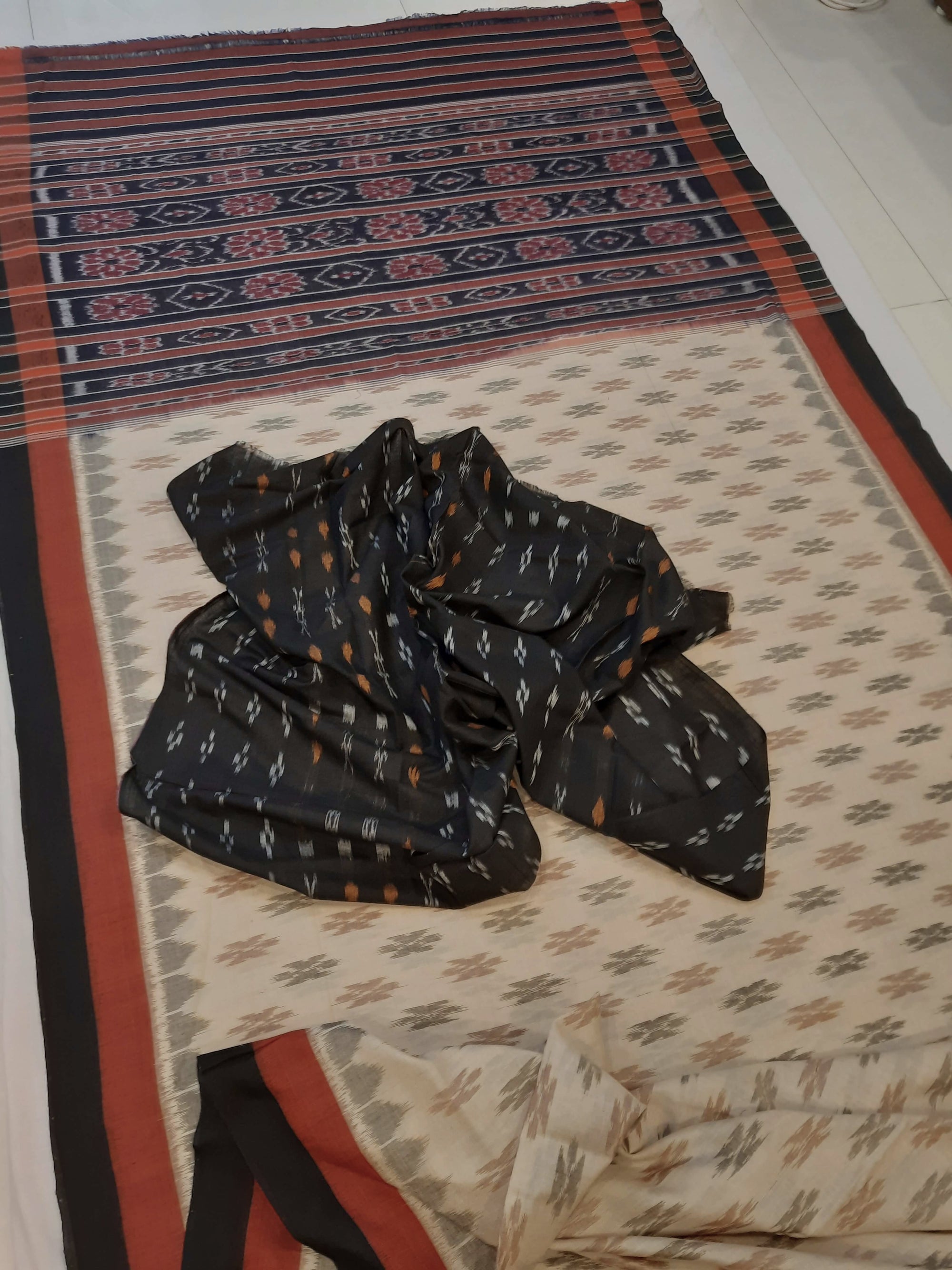 Beige cotton Odisha Ikat saree with cotton ikat blouse piece