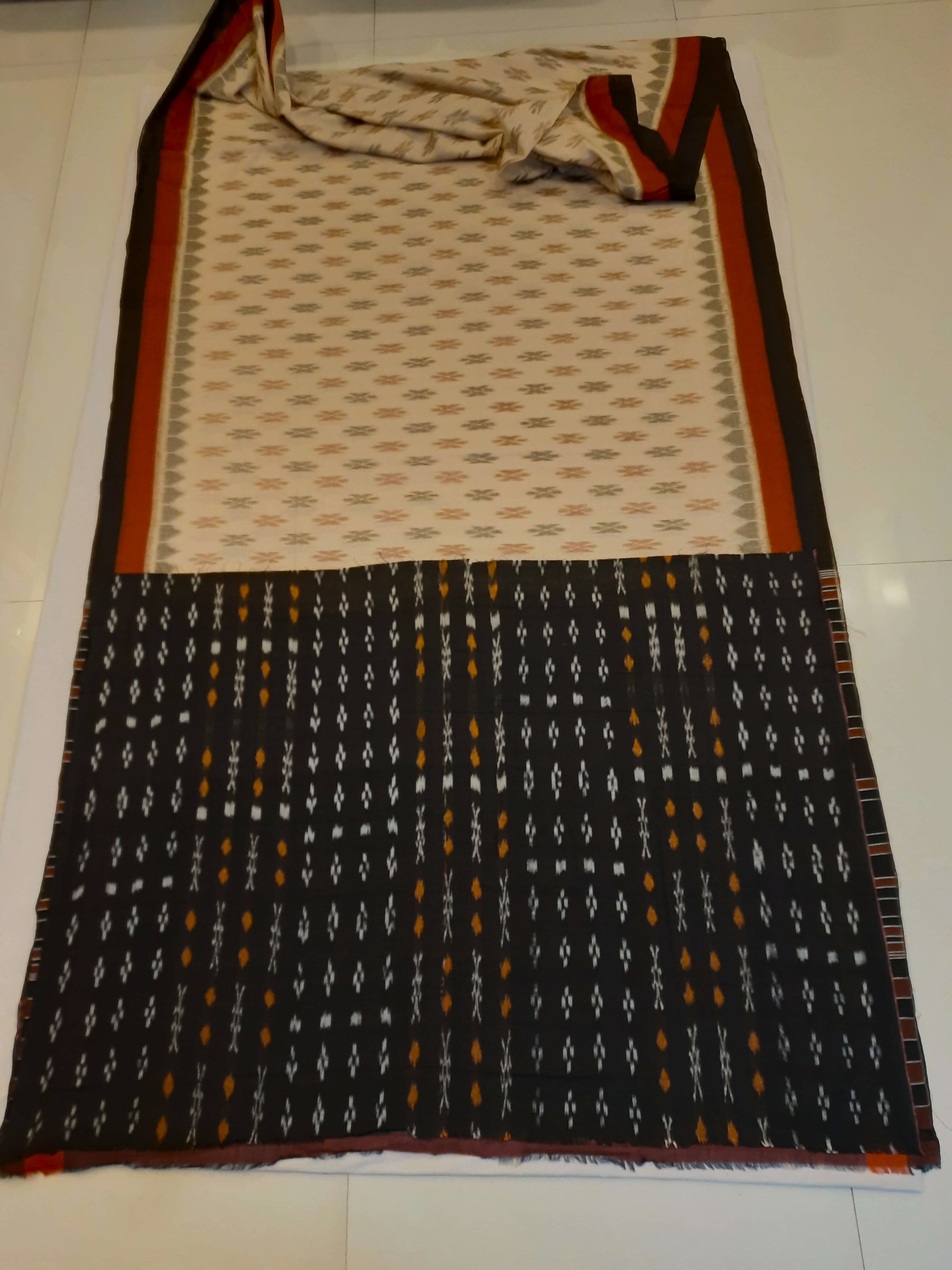 Beige cotton Odisha Ikat saree with cotton ikat blouse piece