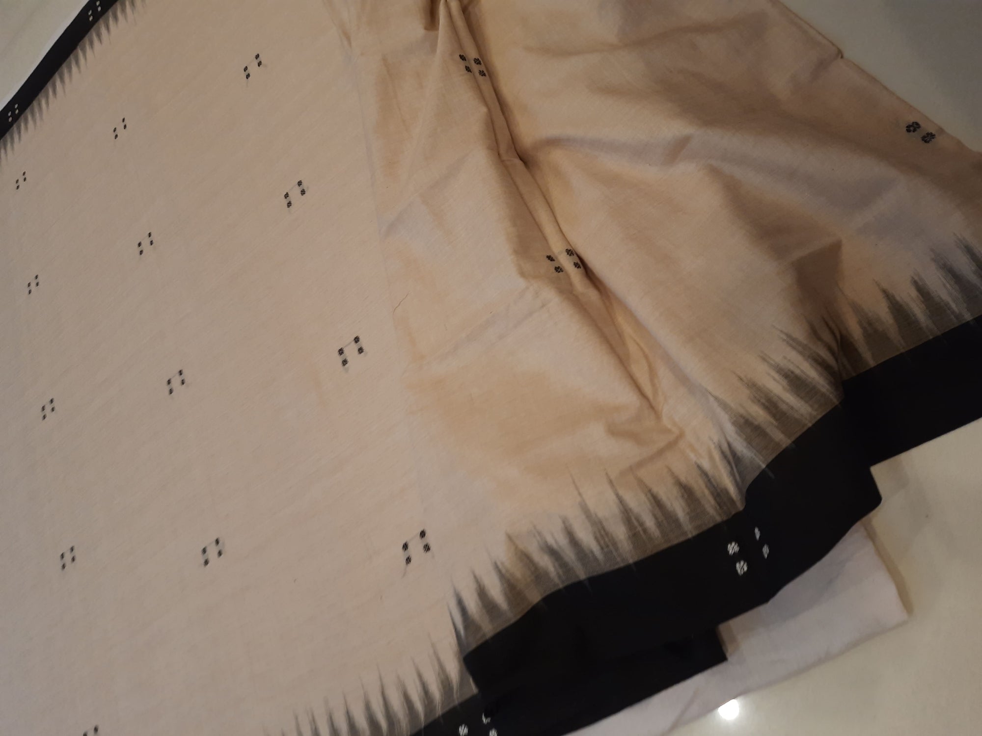 Beige with Black Cotton Odisha Ikat saree with black cotton ikat blouse piece