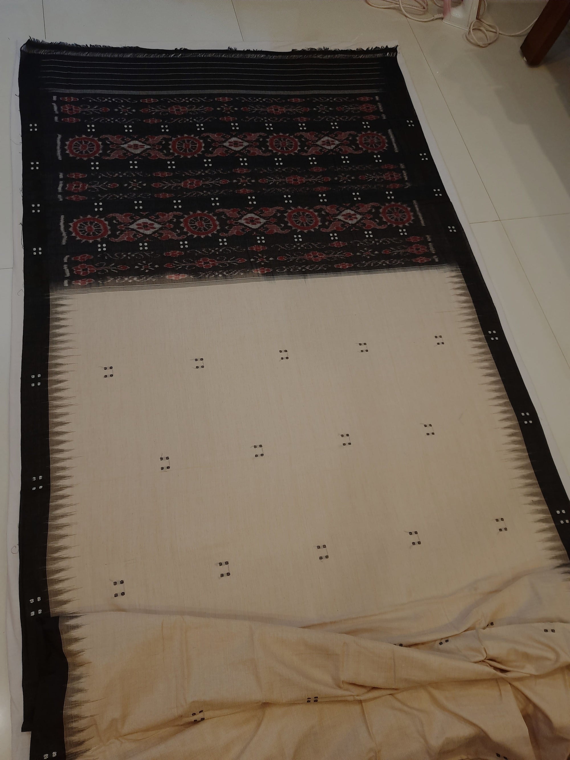 Beige with Black Cotton Odisha Ikat saree with black cotton ikat blouse piece