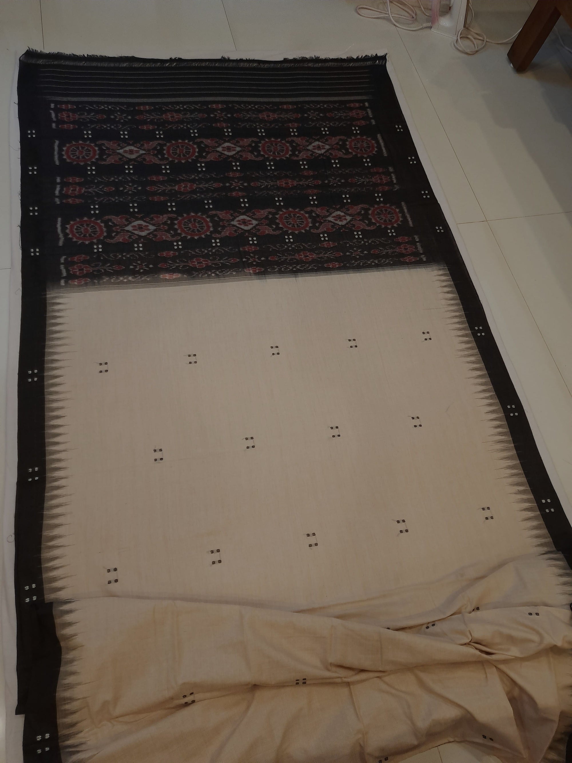 Beige with Black Cotton Odisha Ikat saree with black cotton ikat blouse piece