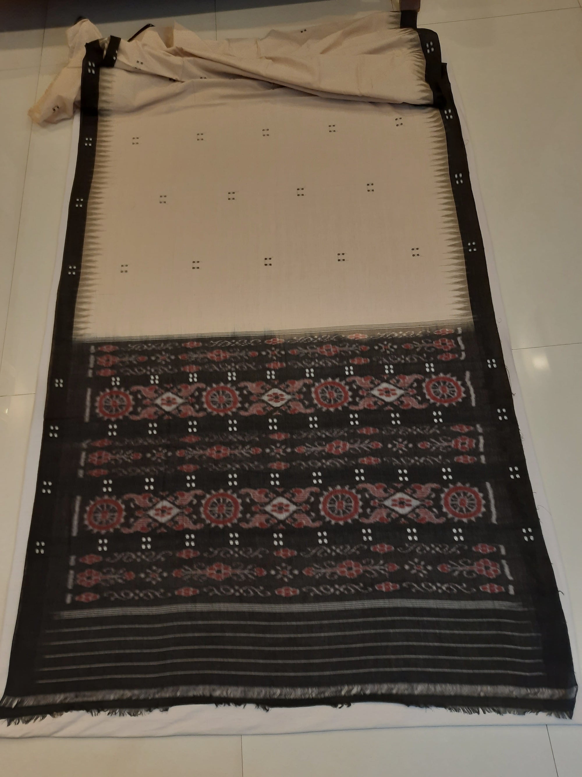 Beige with Black Cotton Odisha Ikat saree with black cotton ikat blouse piece
