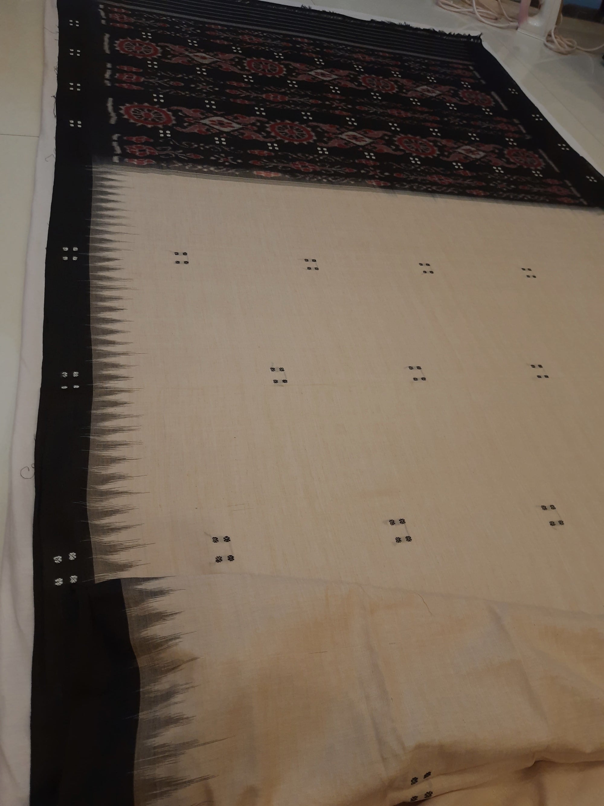 Beige with Black Cotton Odisha Ikat saree with black cotton ikat blouse piece