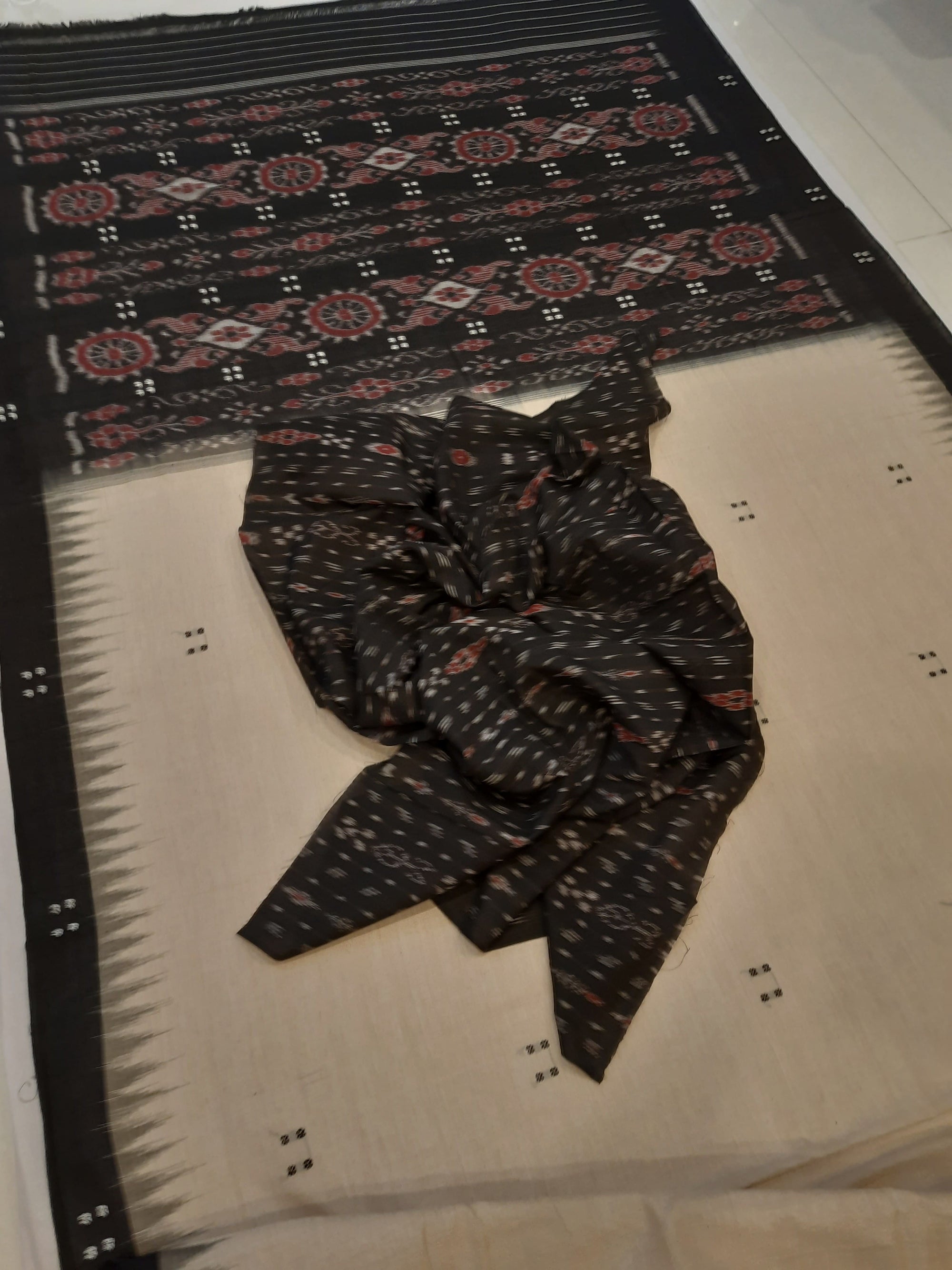 Beige with Black Cotton Odisha Ikat saree with black cotton ikat blouse piece
