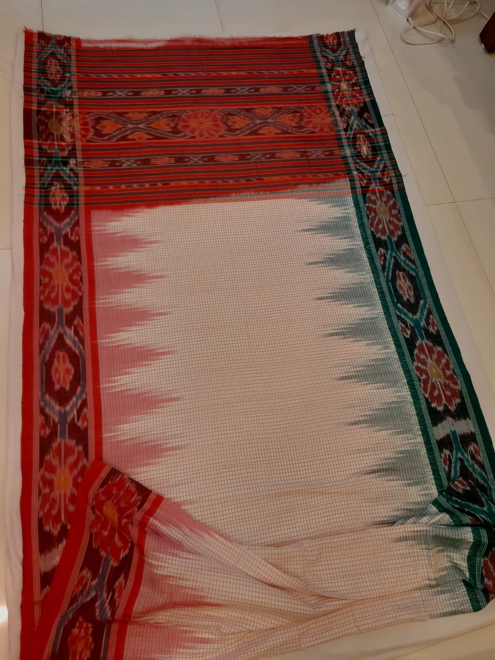 Light Pink Ganga Jamuna border Cotton Odisha Ikat saree with cotton ikat blouse piece