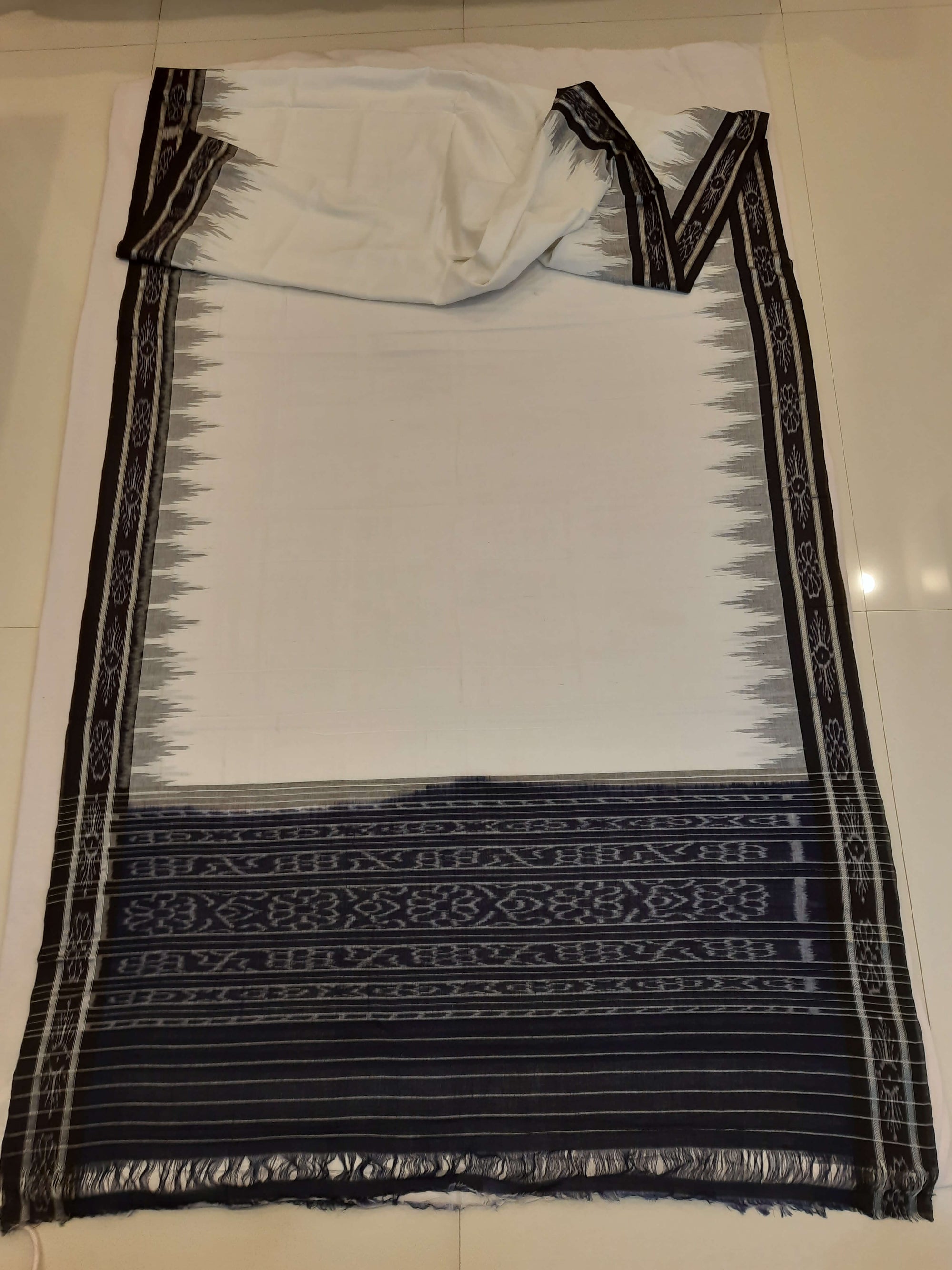 White and Black Odisha Ikat saree with cotton ikat blouse piece
