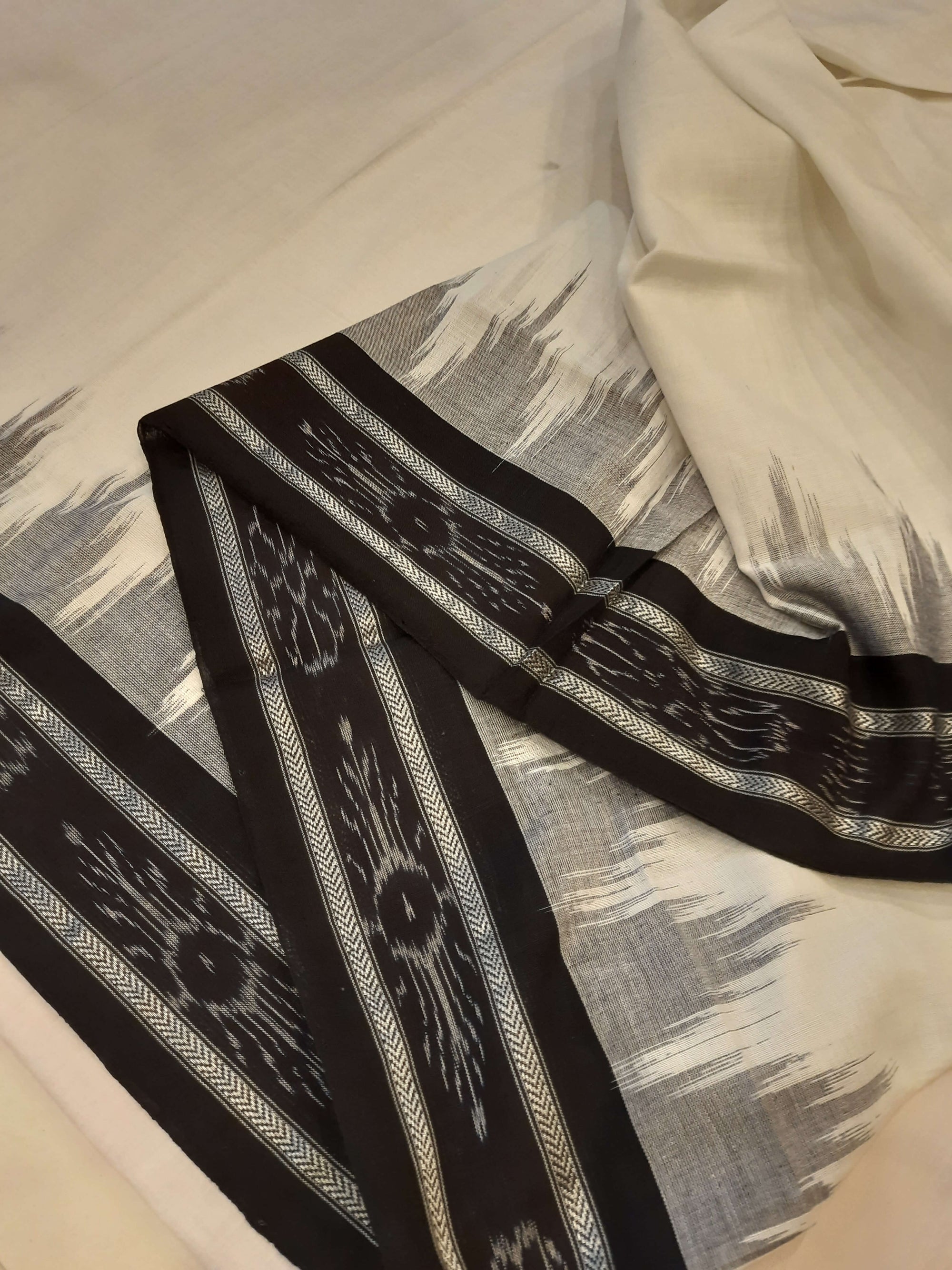 White and Black Odisha Ikat saree with cotton ikat blouse piece