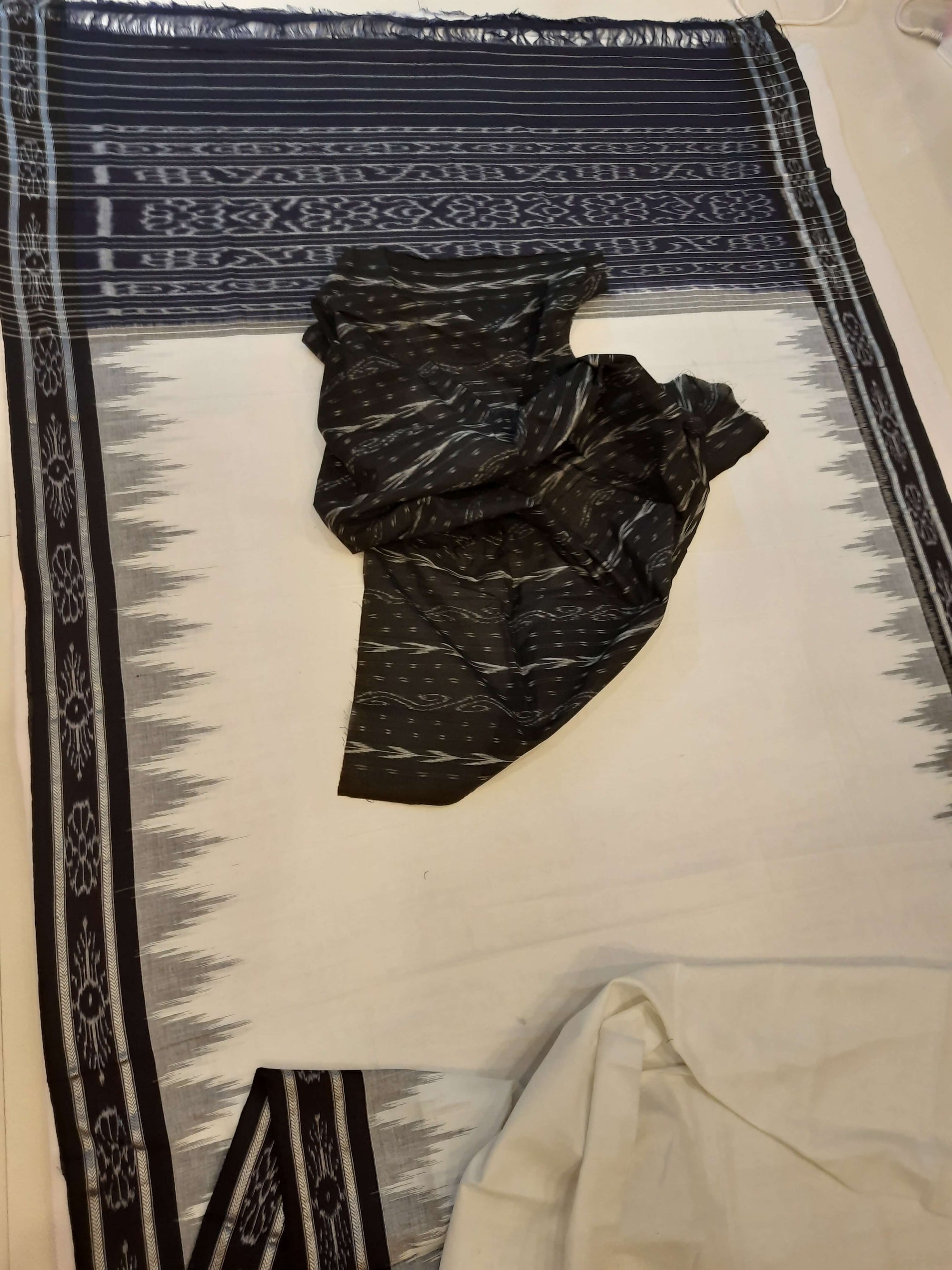 White and Black Odisha Ikat saree with cotton ikat blouse piece