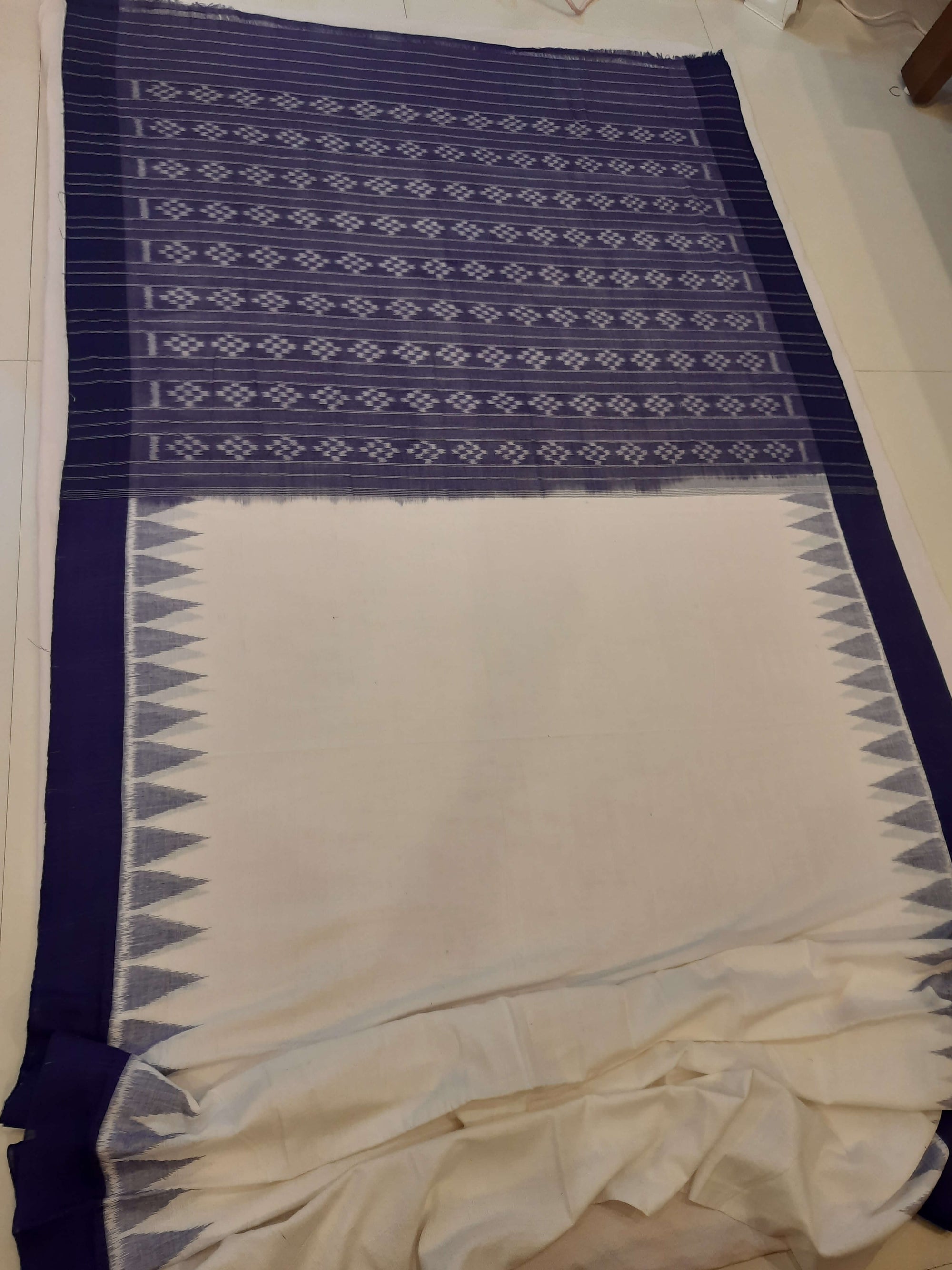White and Blue coloured Odisha Ikat saree  with cotton ikat blouse piece