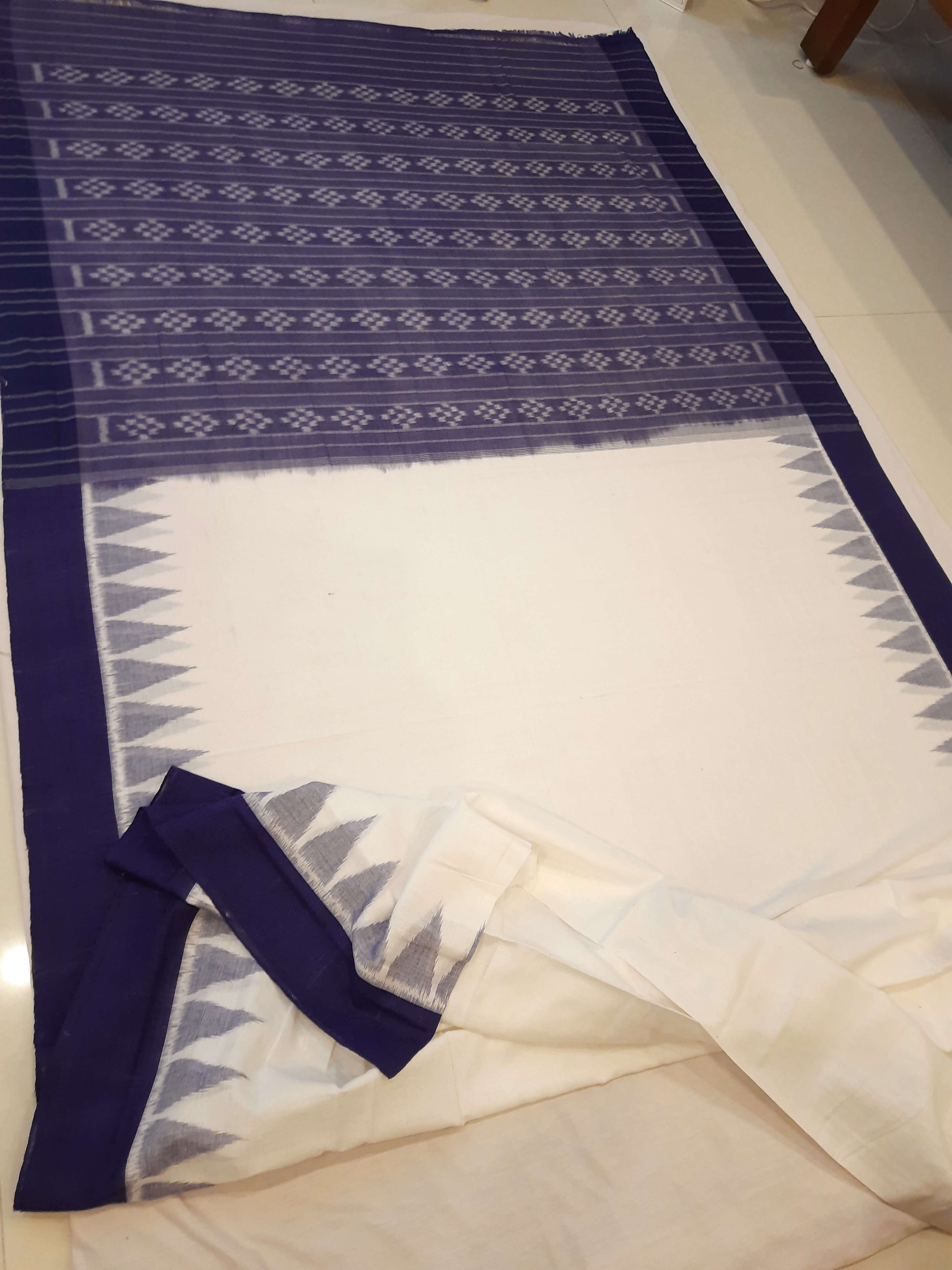 White and Blue coloured Odisha Ikat saree  with cotton ikat blouse piece