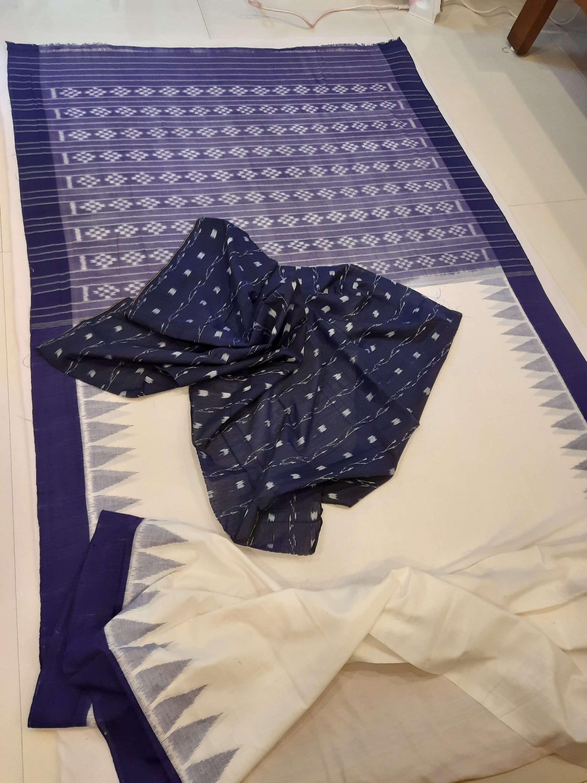 White and Blue coloured Odisha Ikat saree  with cotton ikat blouse piece